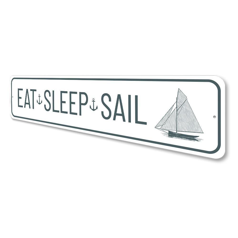 Eat Sleep Sail Sign made of high-quality aluminum, featuring a nautical design perfect for lakehouses.