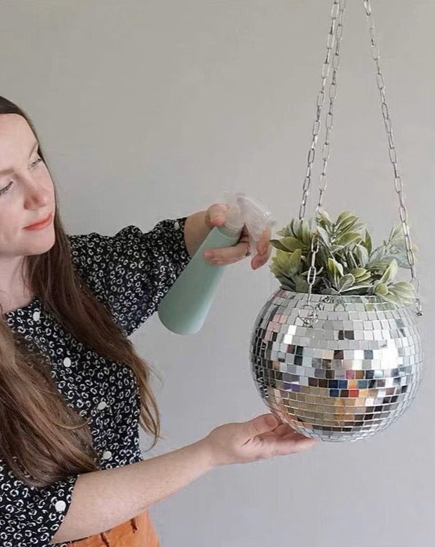 Eclectic Whimsical Disco Ball Hanging Herb Planters showcasing a reflective design, perfect for indoor and outdoor greenery.