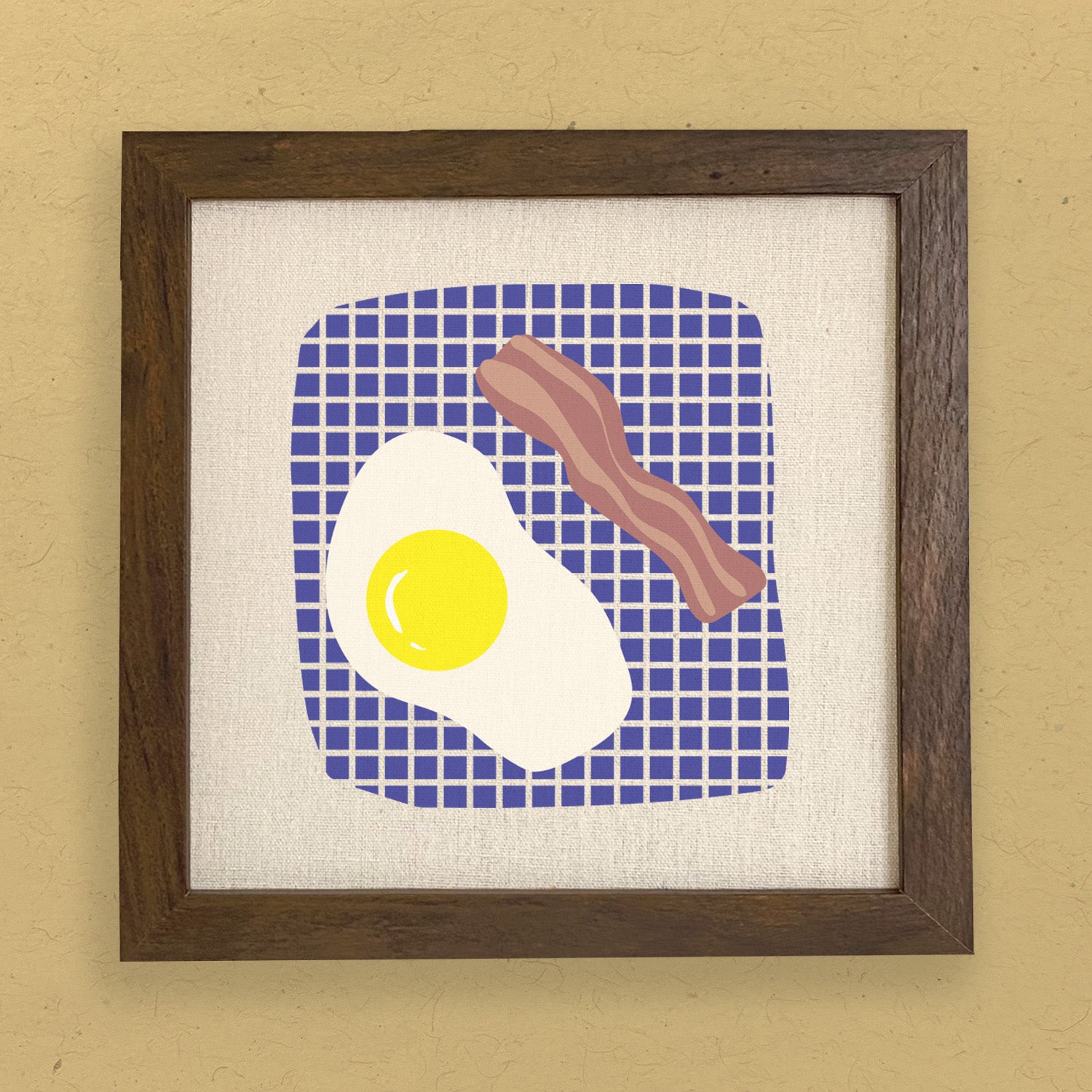A charming framed sign featuring 'Eggs and Bacon' text, set in a stylish wood frame with a linen-look background.