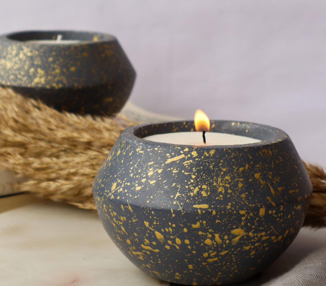 English Lavender Wax Poured Candle in a grey concrete jar with a natural wooden lid, showcasing a minimalist design.