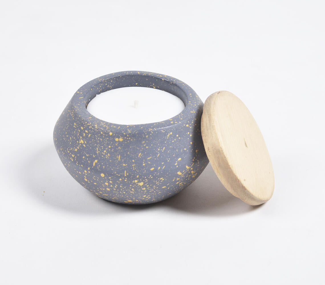 English Lavender Wax Poured Candle in a grey concrete jar with a natural wooden lid, showcasing a minimalist design.