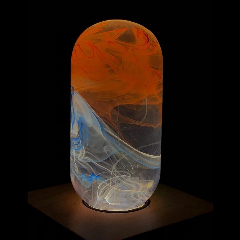 EP LIGHT 4-Pack LED Lights featuring unique handcrafted designs in eco-friendly resin, showcasing various colors and a wooden base.