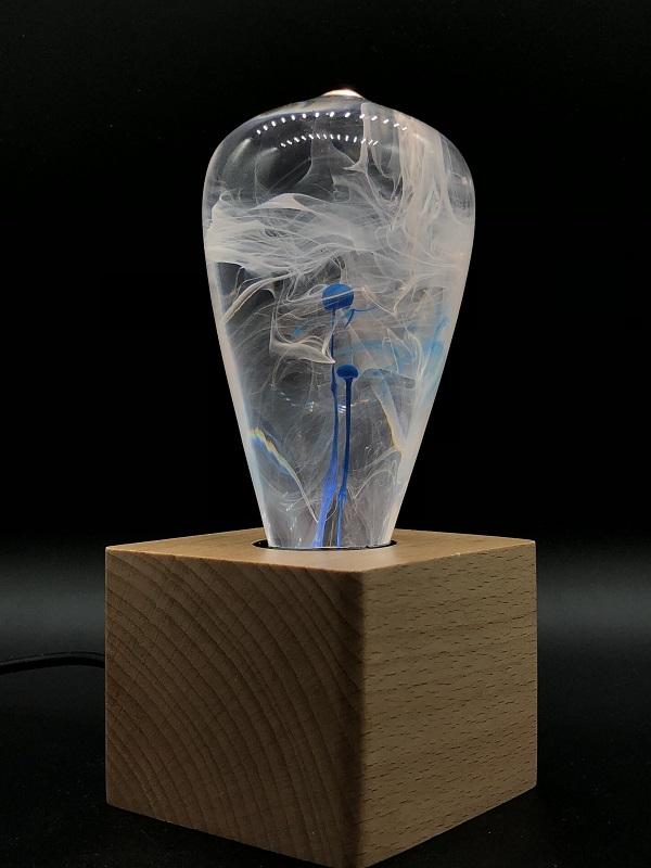 EP Light - Blue-drop Light showcasing a unique blue-drop design, made from eco-friendly resin and beech wood, perfect for any lamp.