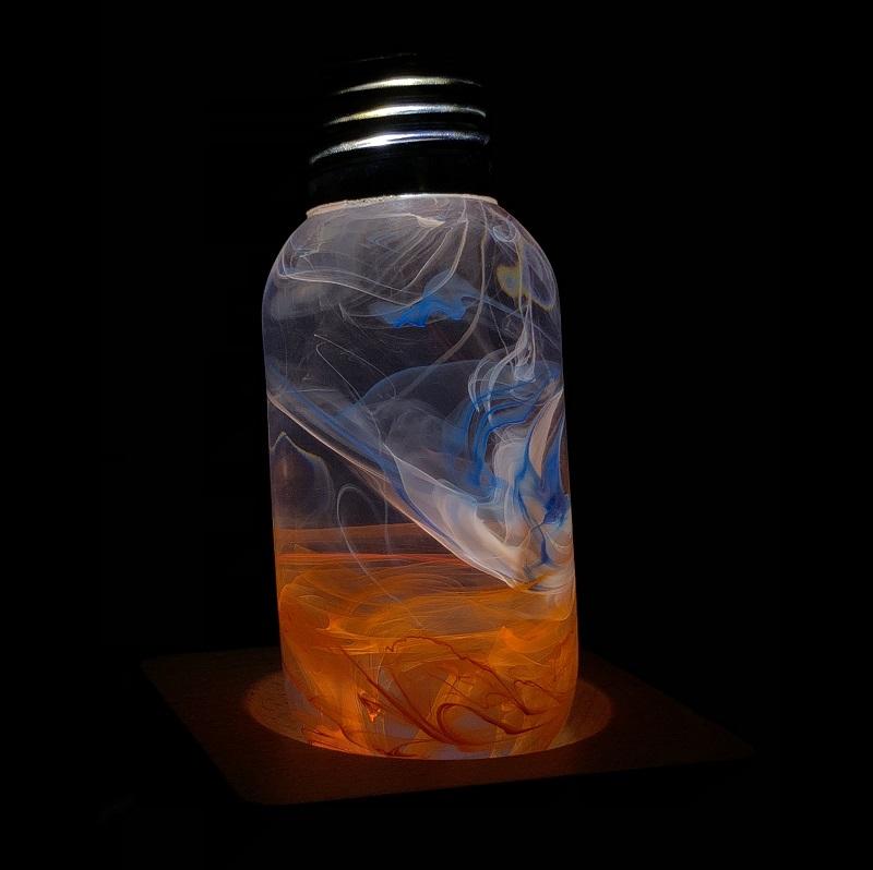 EP LIGHT - Sunrise handcrafted LED bulb with unique resin design, showcasing vibrant colors and intricate paint curves.