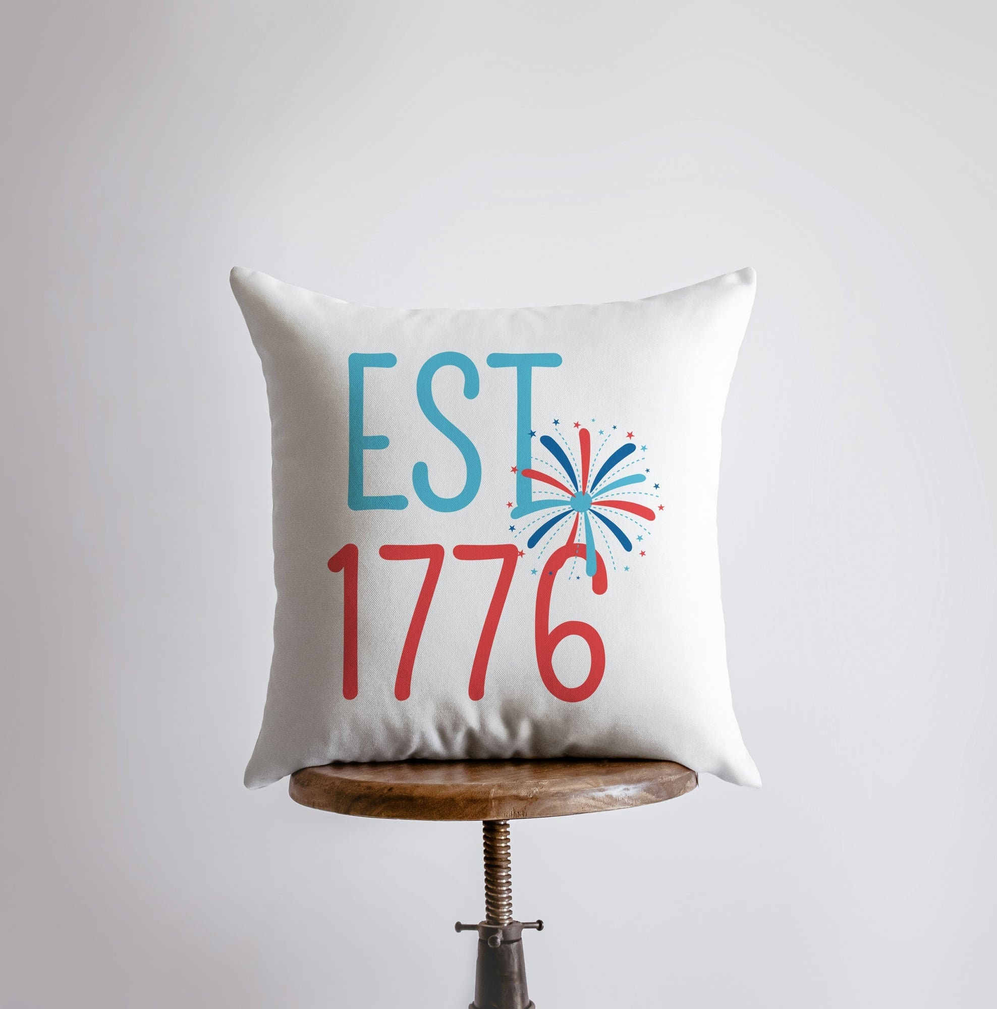 Est 1776 pillow cover featuring fireworks background, handmade in America, available in various sizes.