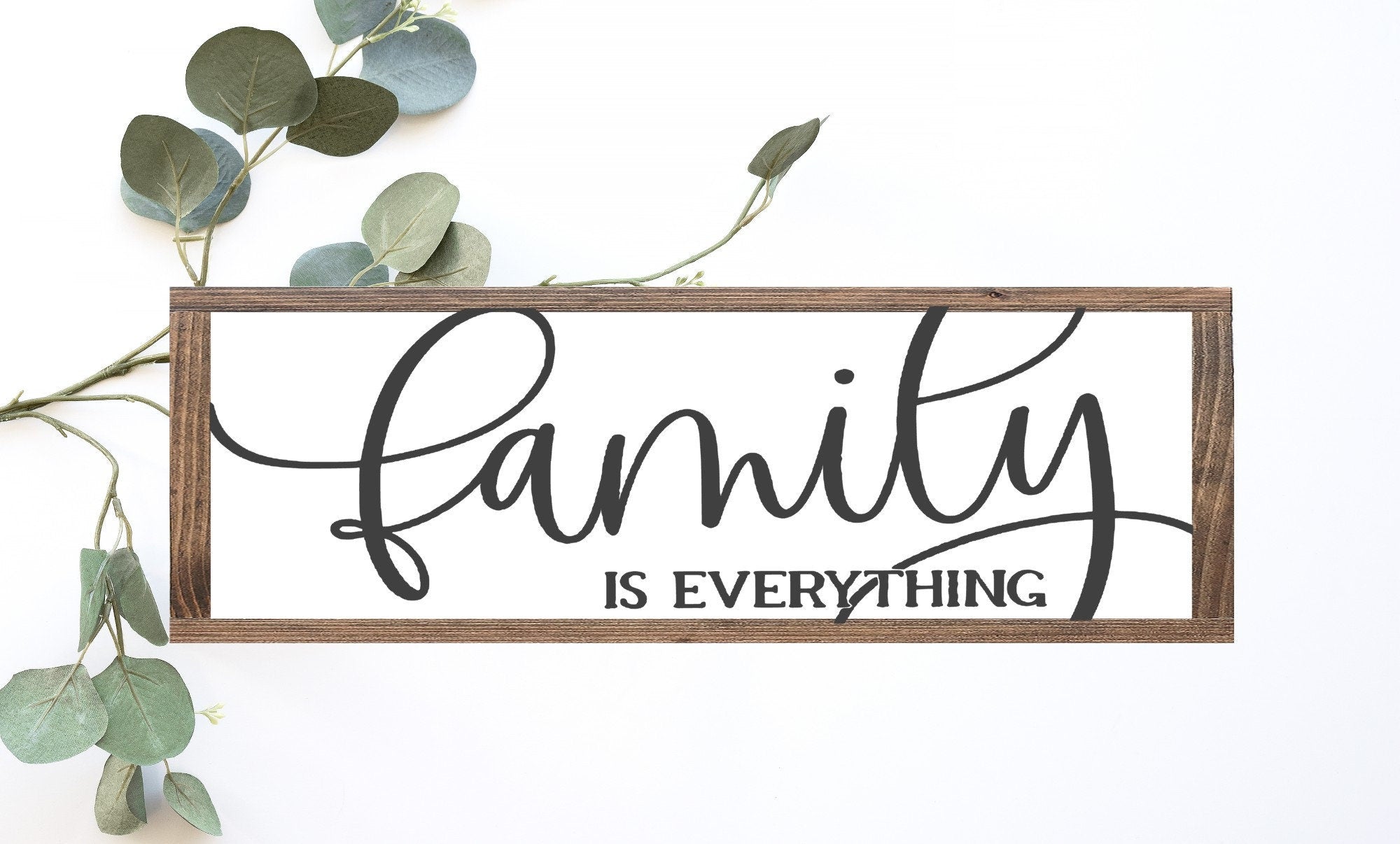 Handmade Family Is Everything Wood Sign in matte white finish, showcasing unique wood grain and knots.