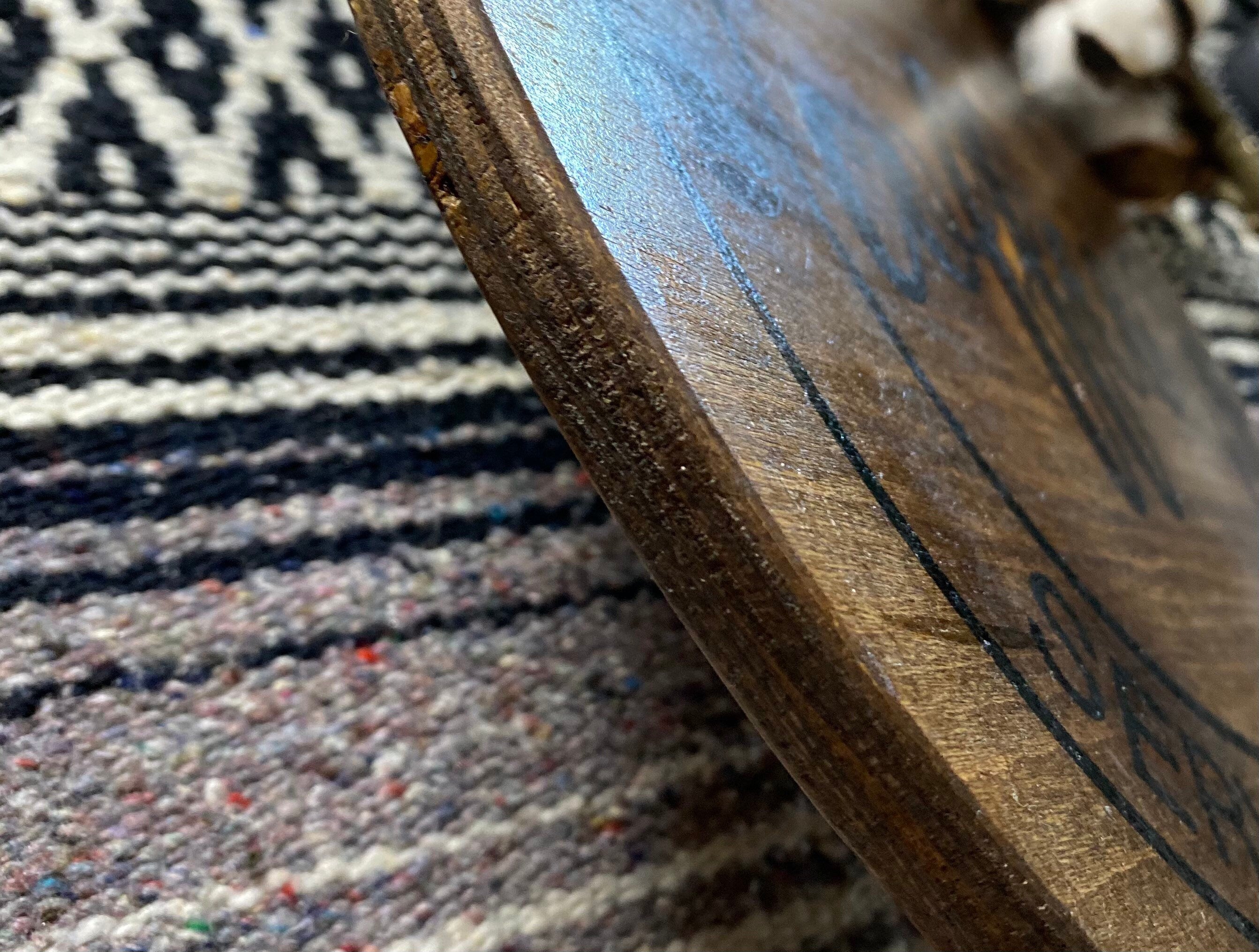 Handmade wooden farmhouse tray with rustic pine finish and cast iron handles, displaying the sentiment 'Farm Fresh Eggs'.