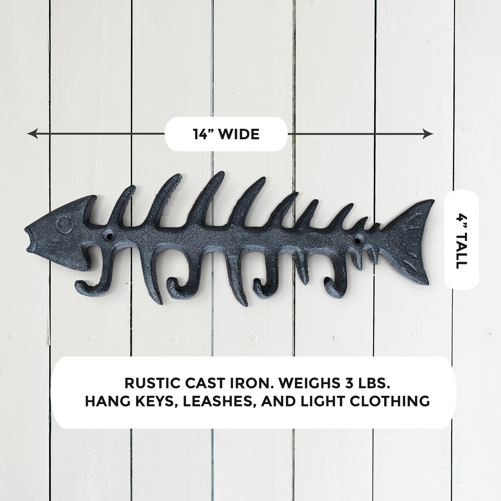 A set of unique fish bones wall hooks made of cast iron, featuring a rustic design with four hooks for hanging items.