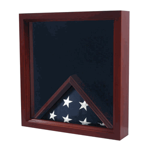 Elegant cherry wood flag display case holding a 3' x 5' folded flag and medals, lined with black felt.