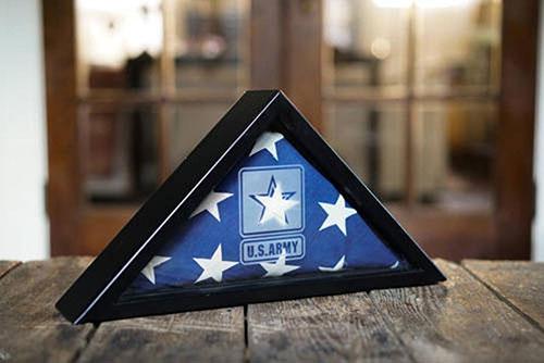 Elegant black military flag frame displaying a 3'x5' flag, featuring a removable back and attached hangers for easy mounting.