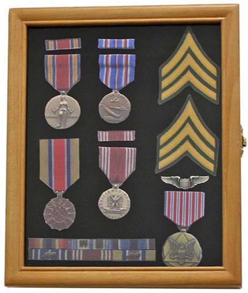 Flag Connections Pin Display Case with glass door, showcasing various pins and medals against a black matted background.