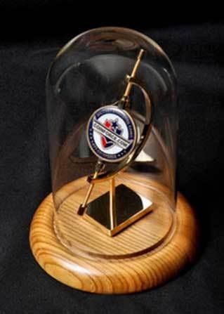 Flags Connections Medium Single Coin Display featuring a glass dome and oak base, showcasing a medium-sized coin.