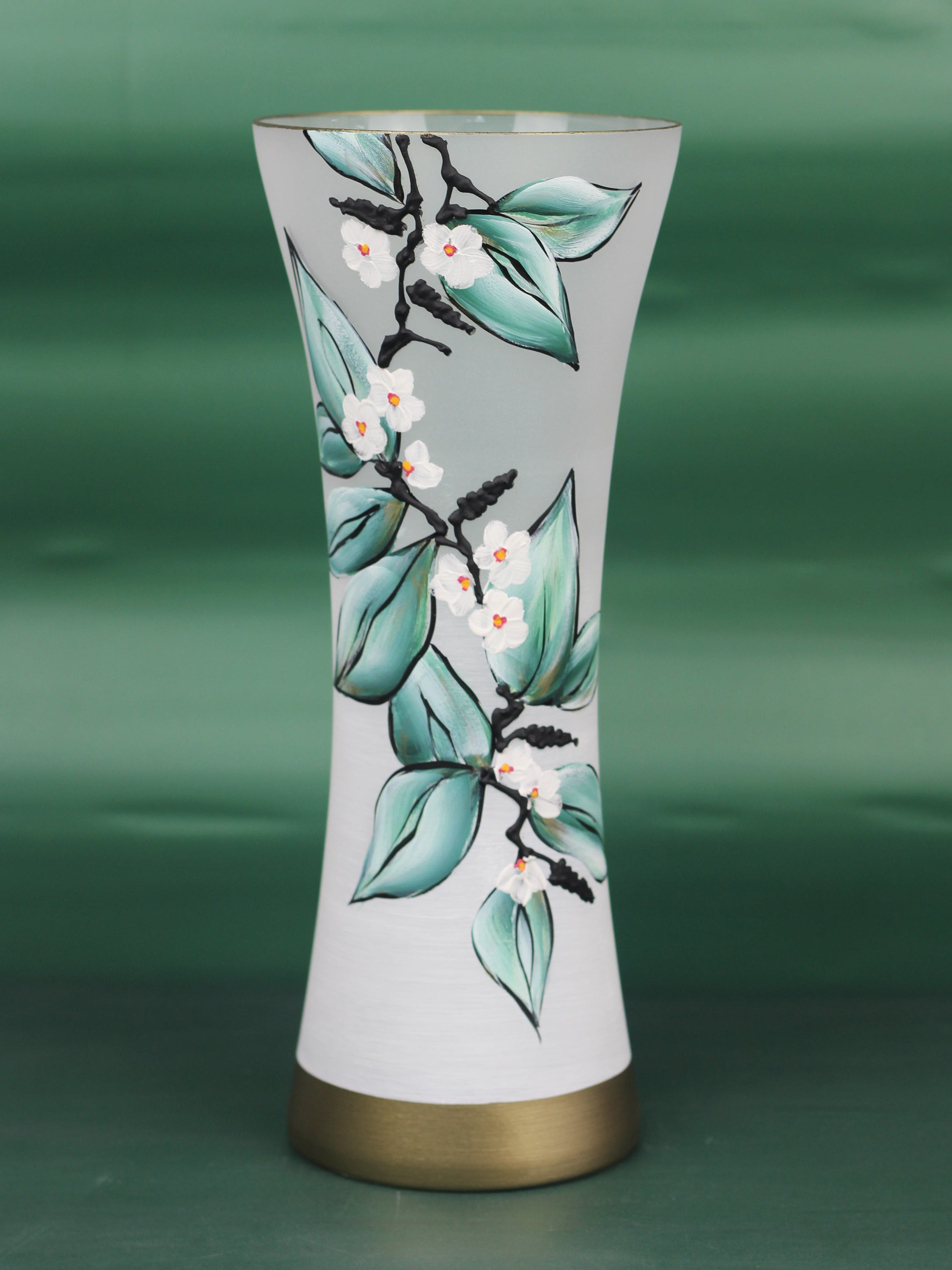 A beautifully hand-painted green glass vase with intricate designs, showcasing unique artistry and high-quality craftsmanship.