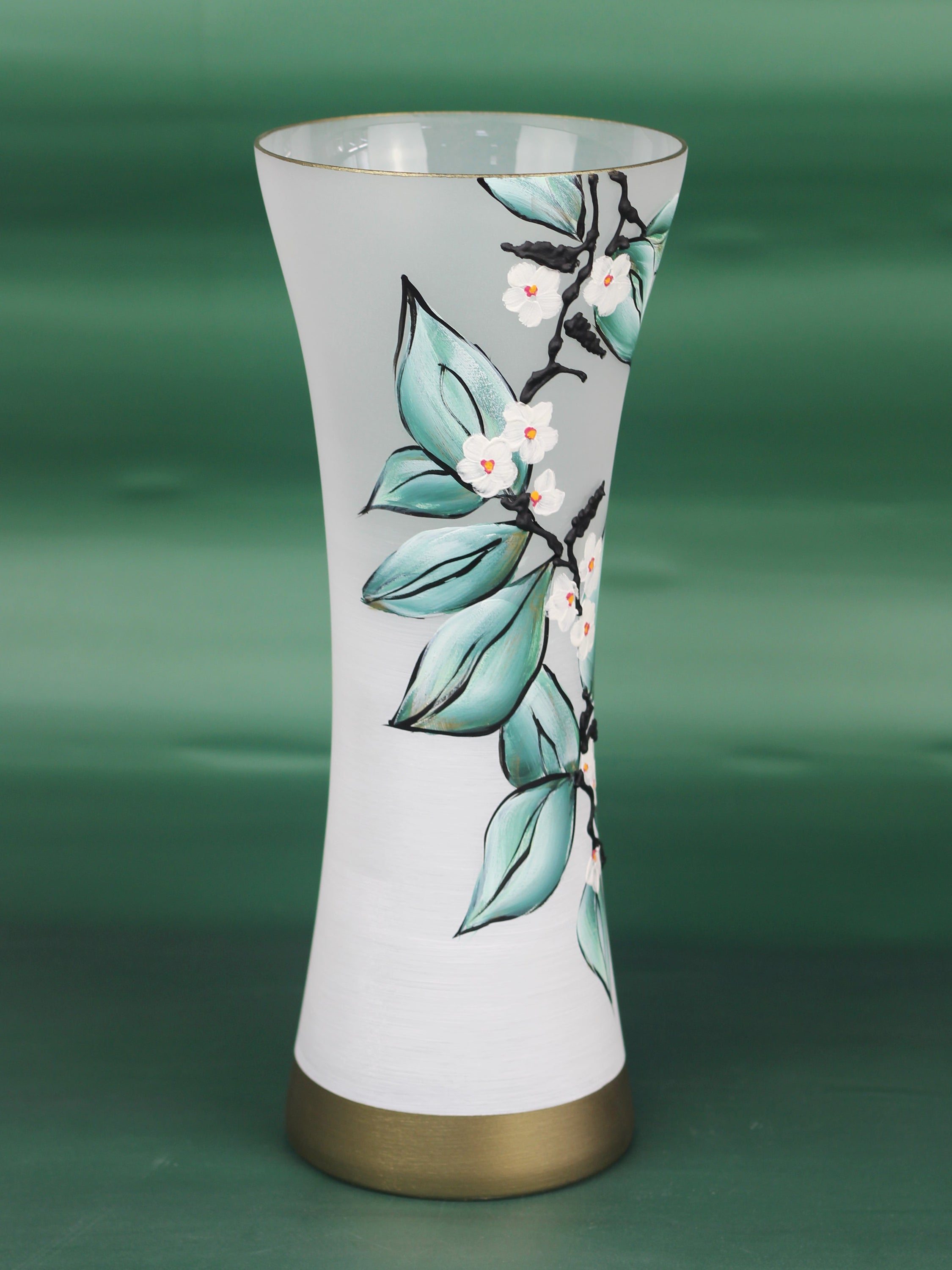 A beautifully hand-painted green glass vase with intricate designs, showcasing unique artistry and high-quality craftsmanship.