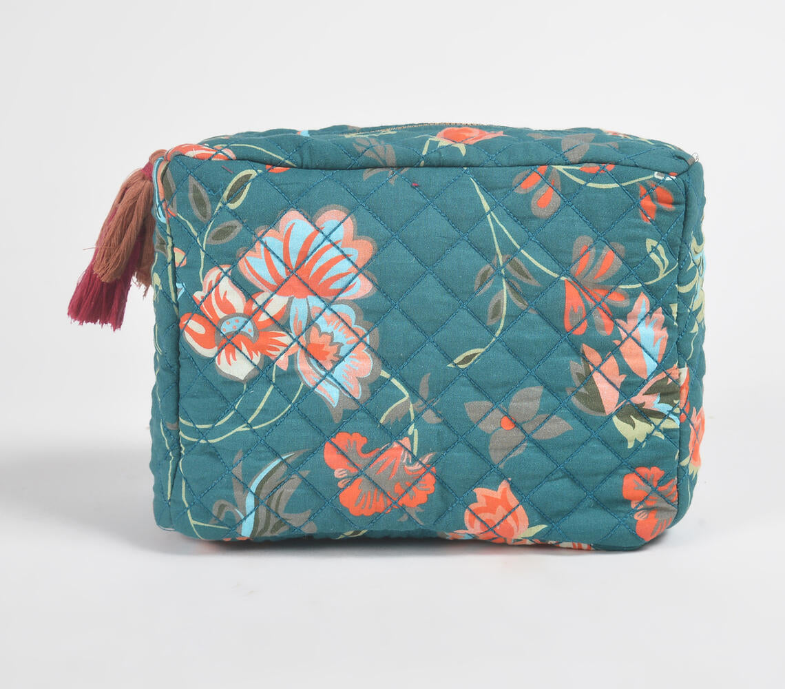 Floral Printed & Quilted Emerald Travel Pouch with tassels and zip closure, showcasing vibrant multicolor floral patterns.