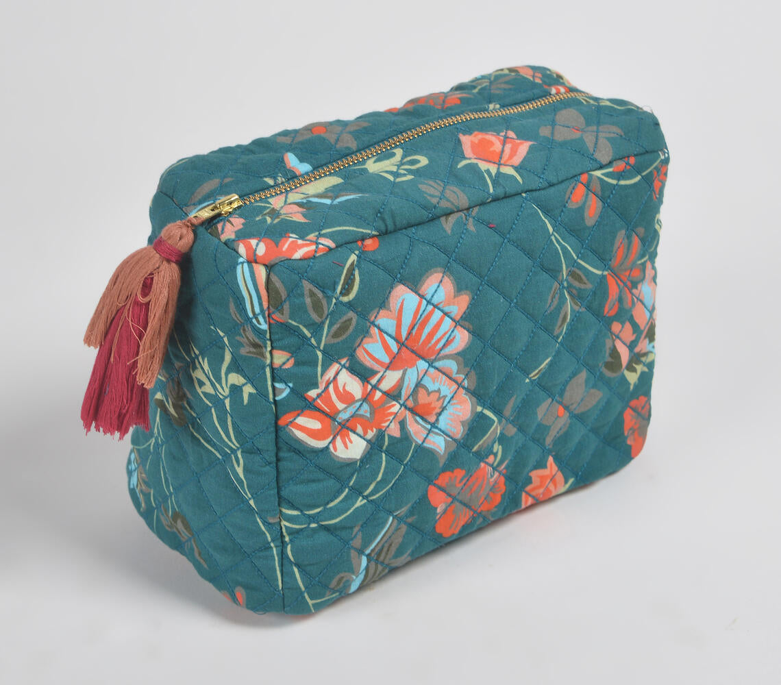 Floral Printed & Quilted Emerald Travel Pouch with tassels and zip closure, showcasing vibrant multicolor floral patterns.