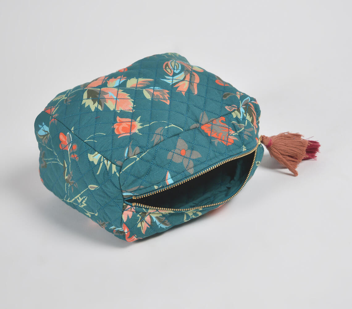 Floral Printed & Quilted Emerald Travel Pouch with tassels and zip closure, showcasing vibrant multicolor floral patterns.