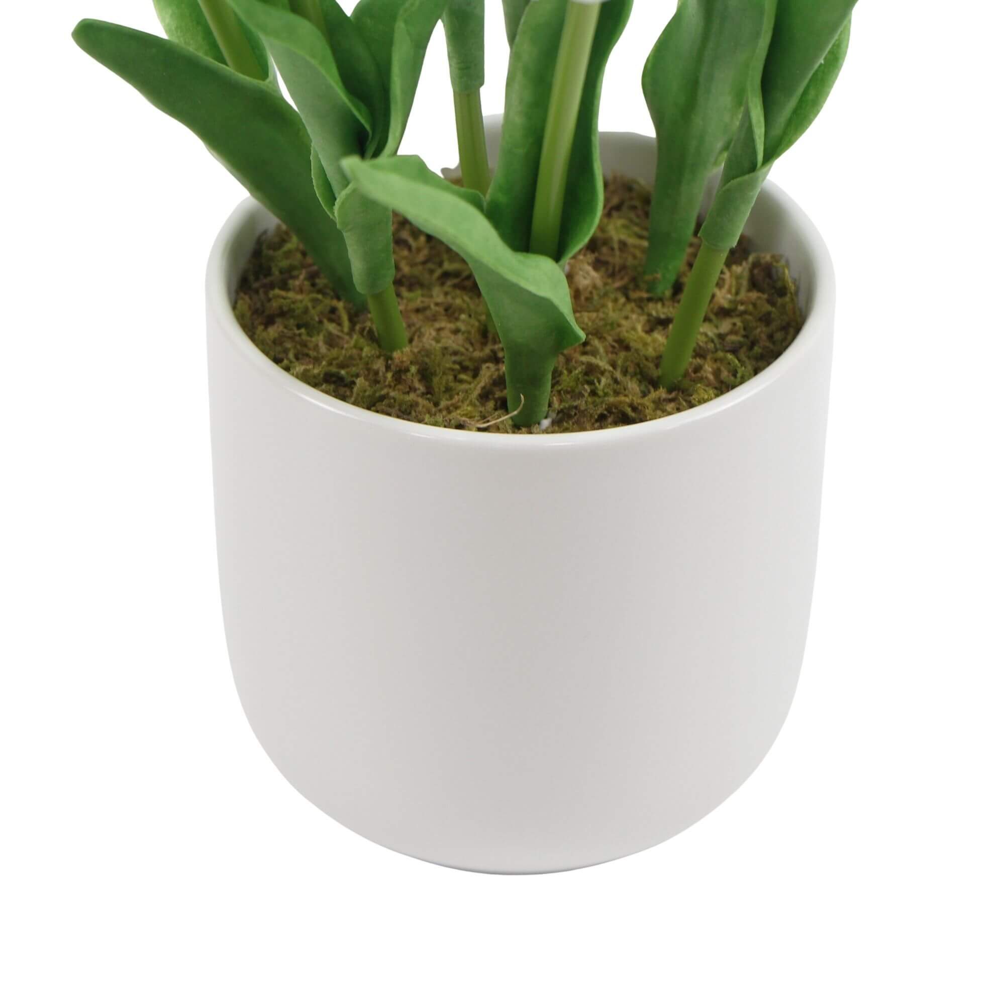 A beautiful arrangement of white artificial tulips in a modern ceramic bowl, showcasing vibrant blooms and lush green foliage.