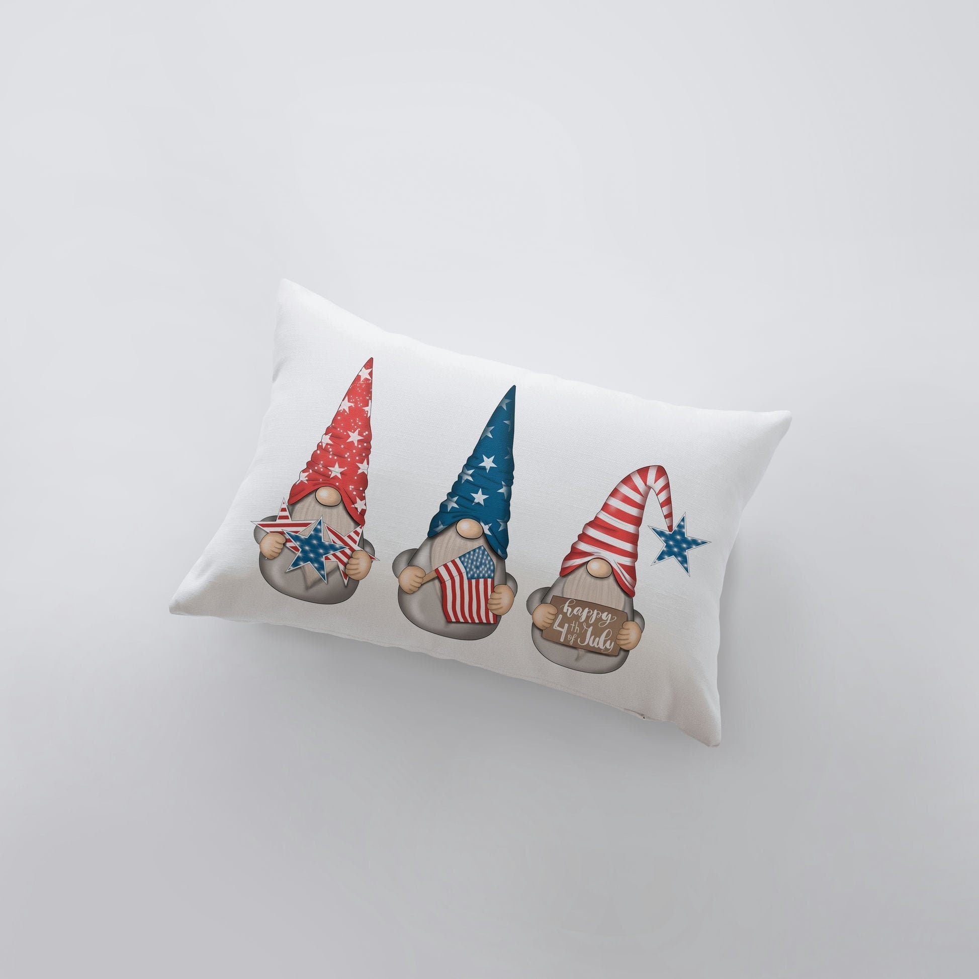 A festive Fourth of July Gnome pillow cover featuring gnomes with stars and stripes hats, perfect for holiday decor.