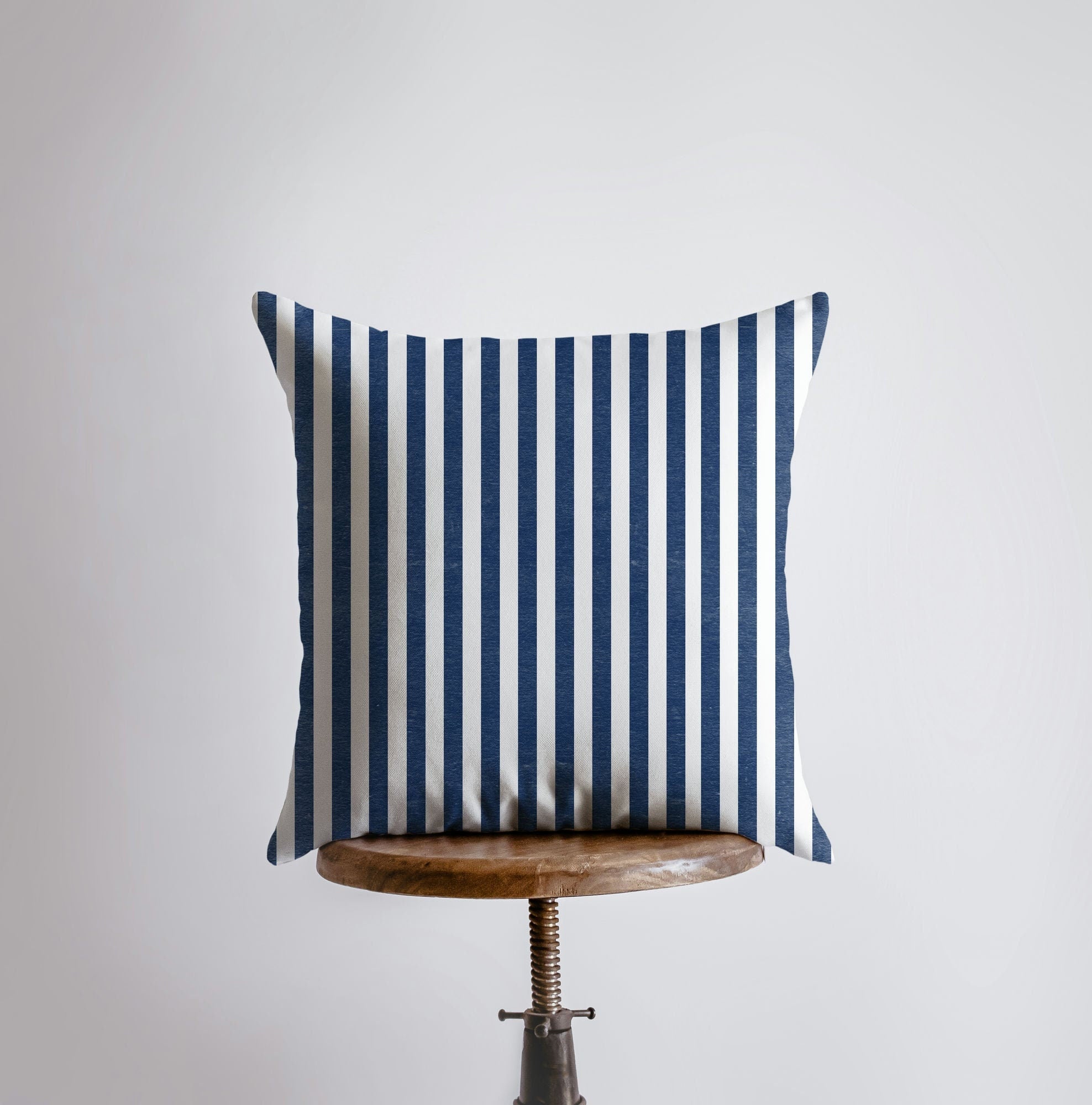 Double-sided Fourth of July striped pillow cover featuring blue and red stripes, perfect for patriotic decor.
