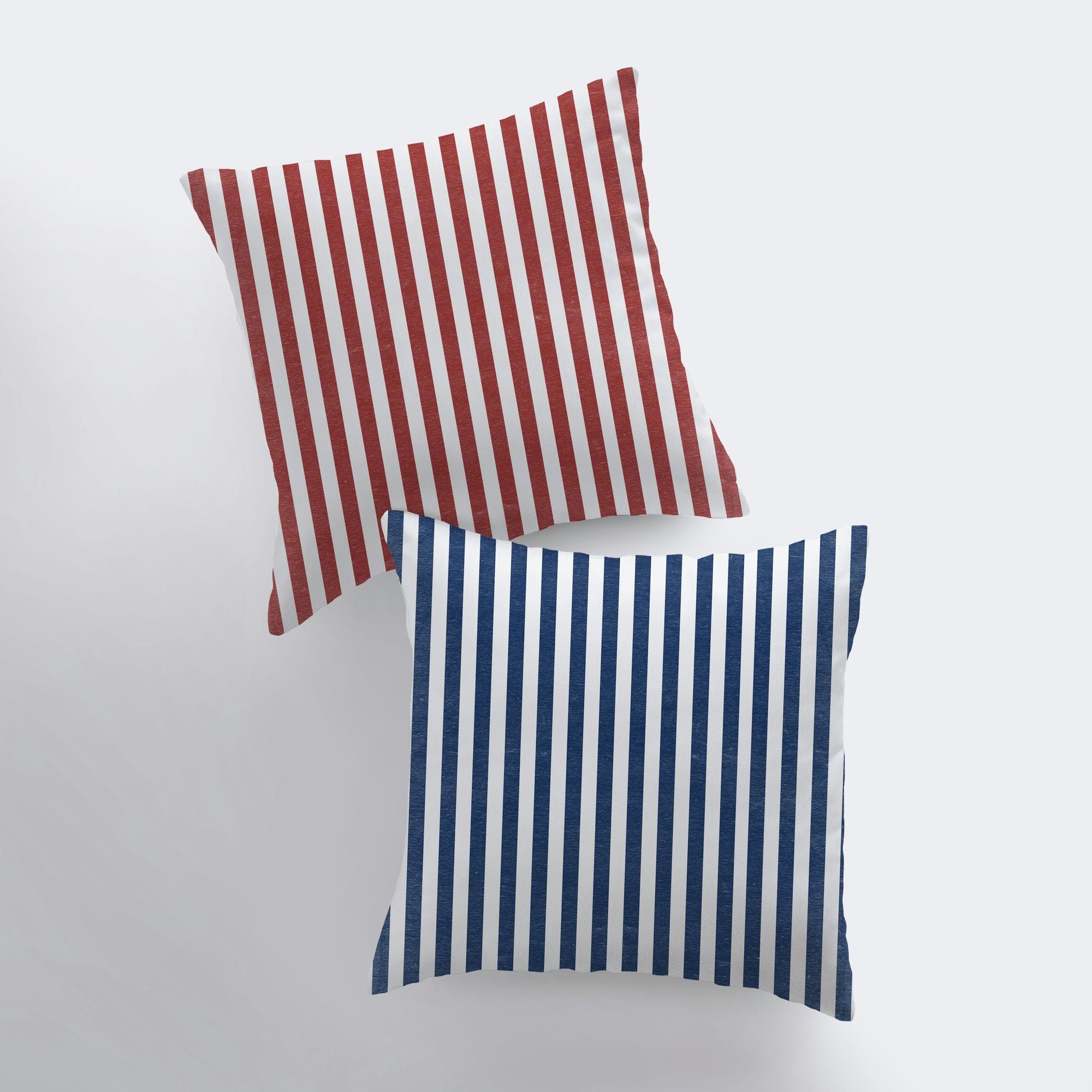 Double-sided Fourth of July striped pillow cover featuring blue and red stripes, perfect for patriotic decor.