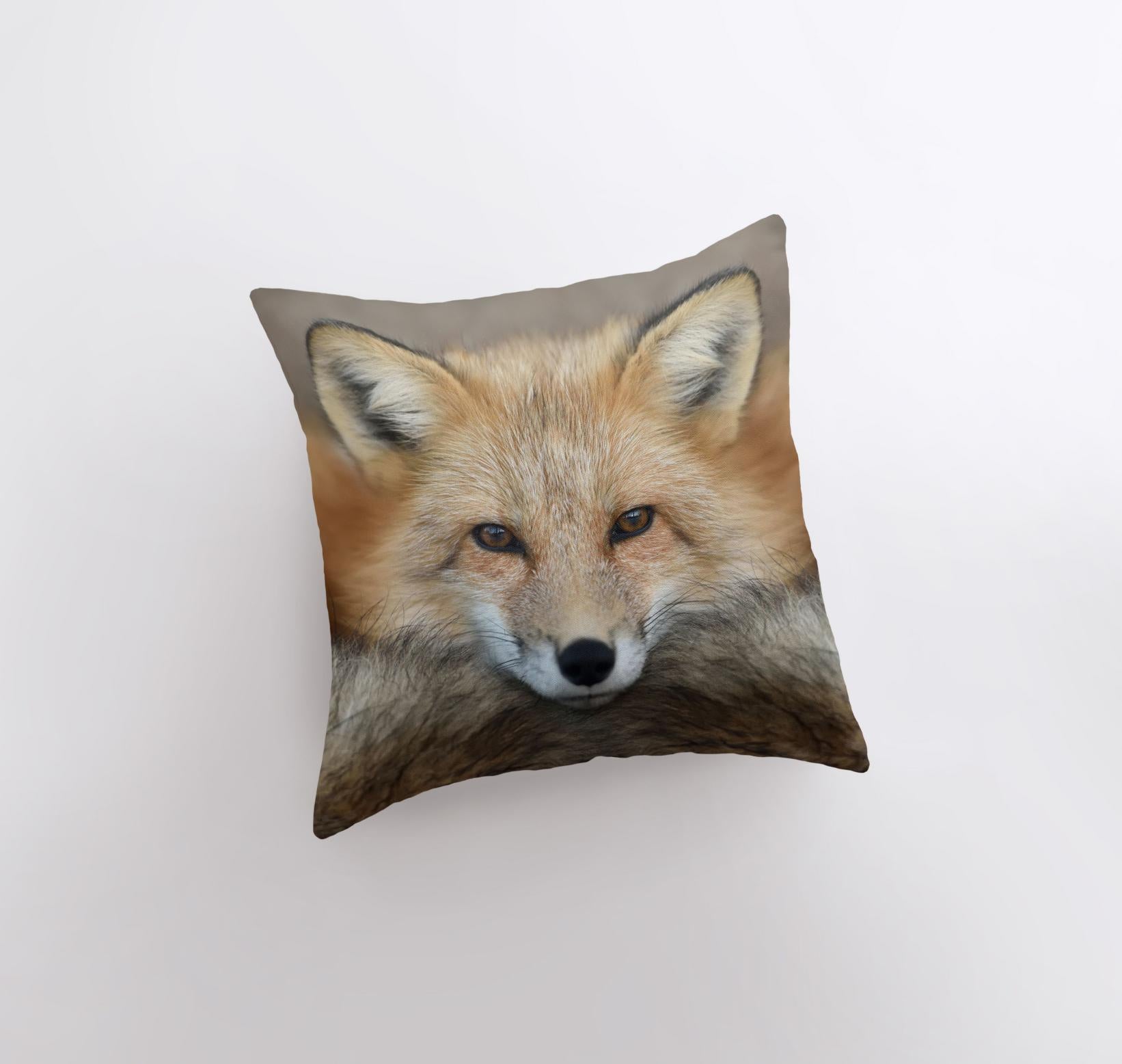 A beautifully crafted pillow cover featuring a close-up photograph of a curious fox, set against a light beige background with a concealed zipper.
