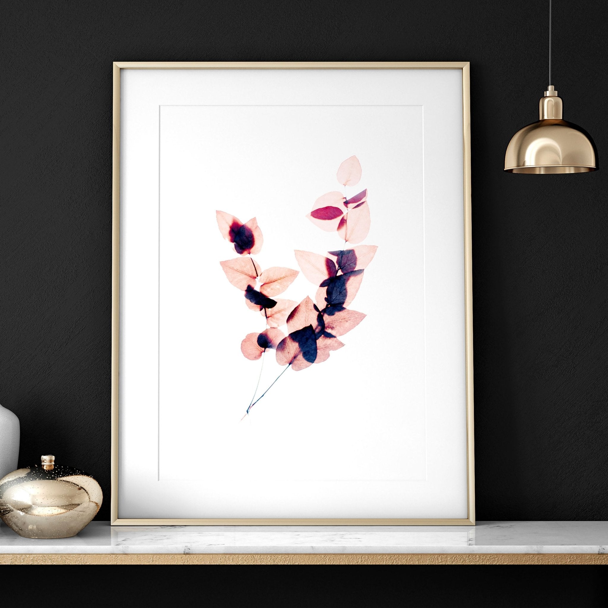 Set of 2 framed Autumnal Botanical wall art prints in rich Burgundy tones, showcasing intricate leaves and blooms for a cozy bedroom atmosphere.