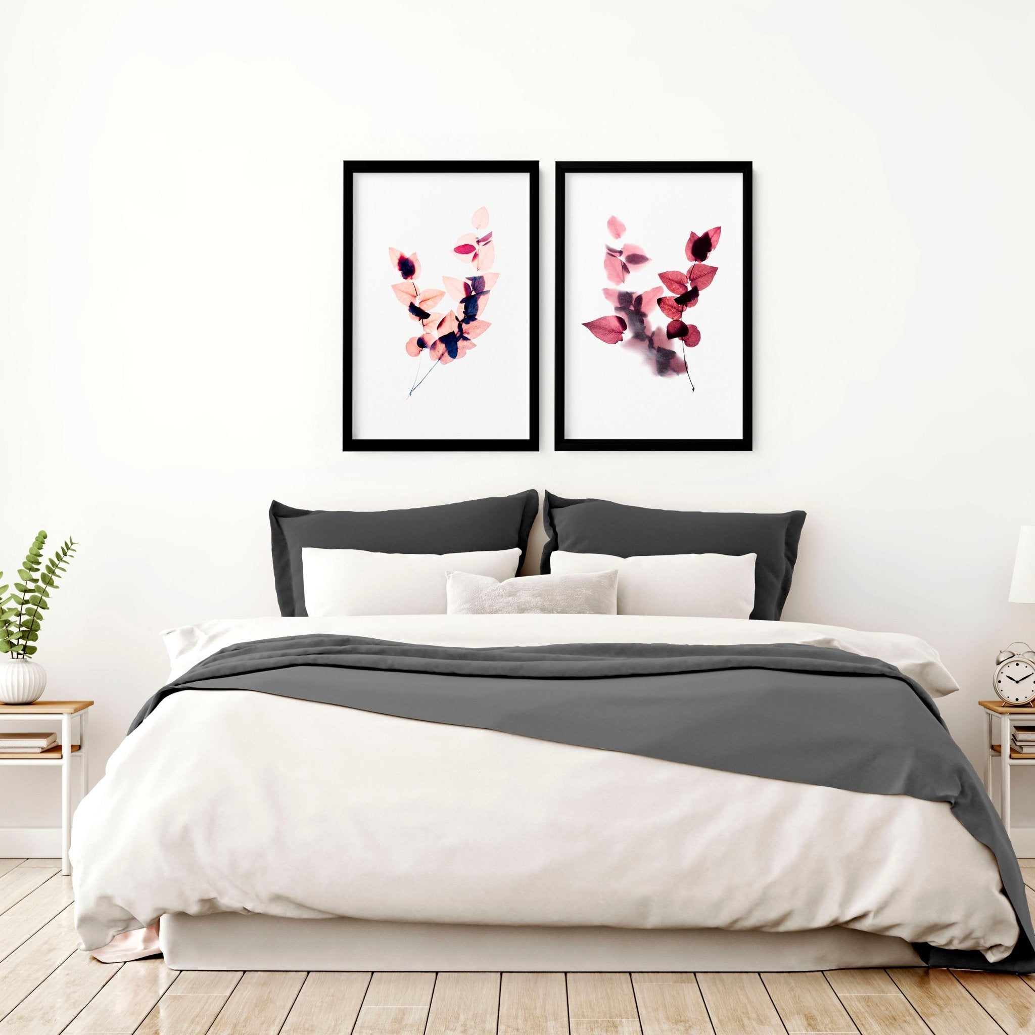 Set of 2 framed Autumnal Botanical wall art prints in rich Burgundy tones, showcasing intricate leaves and blooms for a cozy bedroom atmosphere.