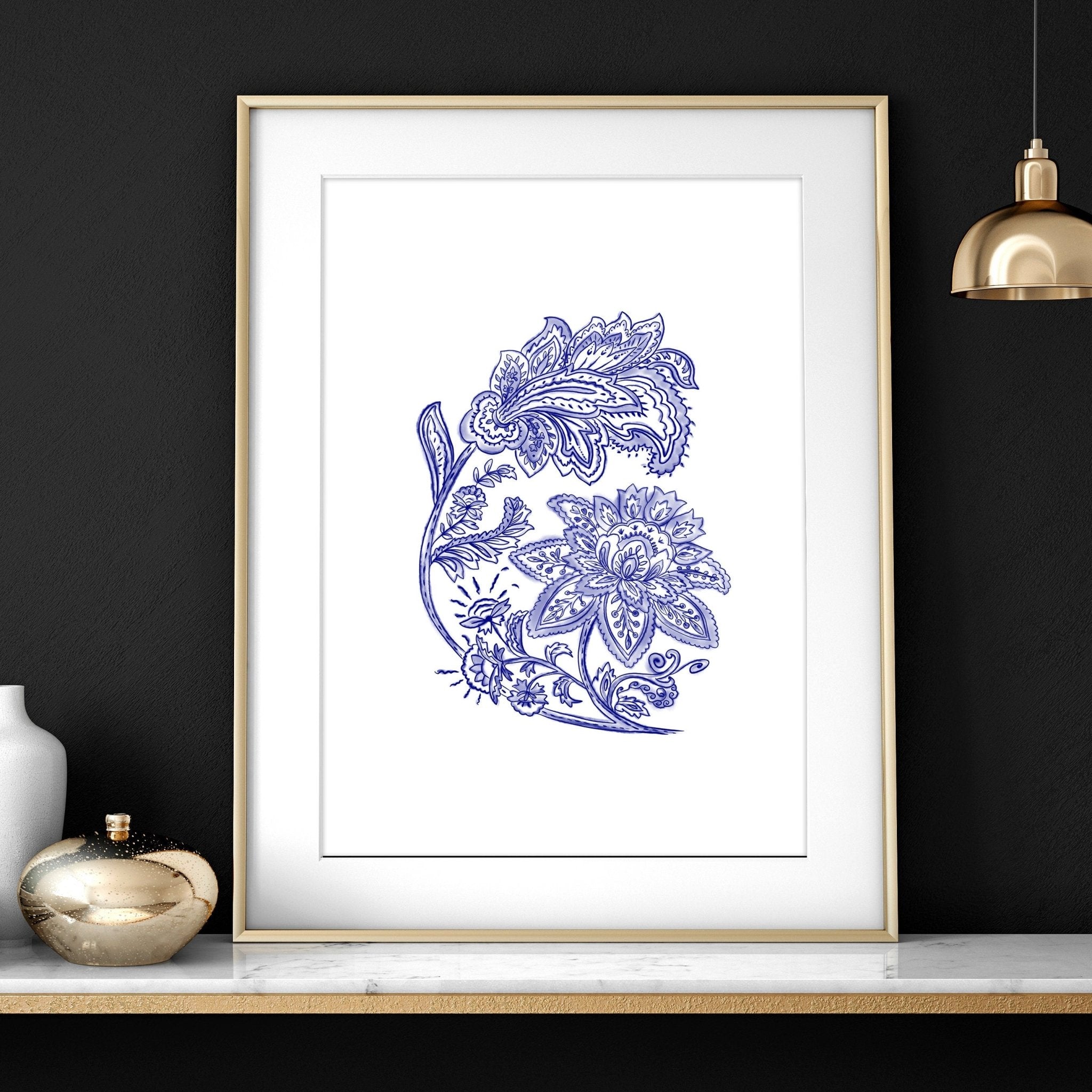 Set of 3 framed wall art prints featuring hand-drawn paisley motifs in indigo blue, perfect for bohemian living room decor.