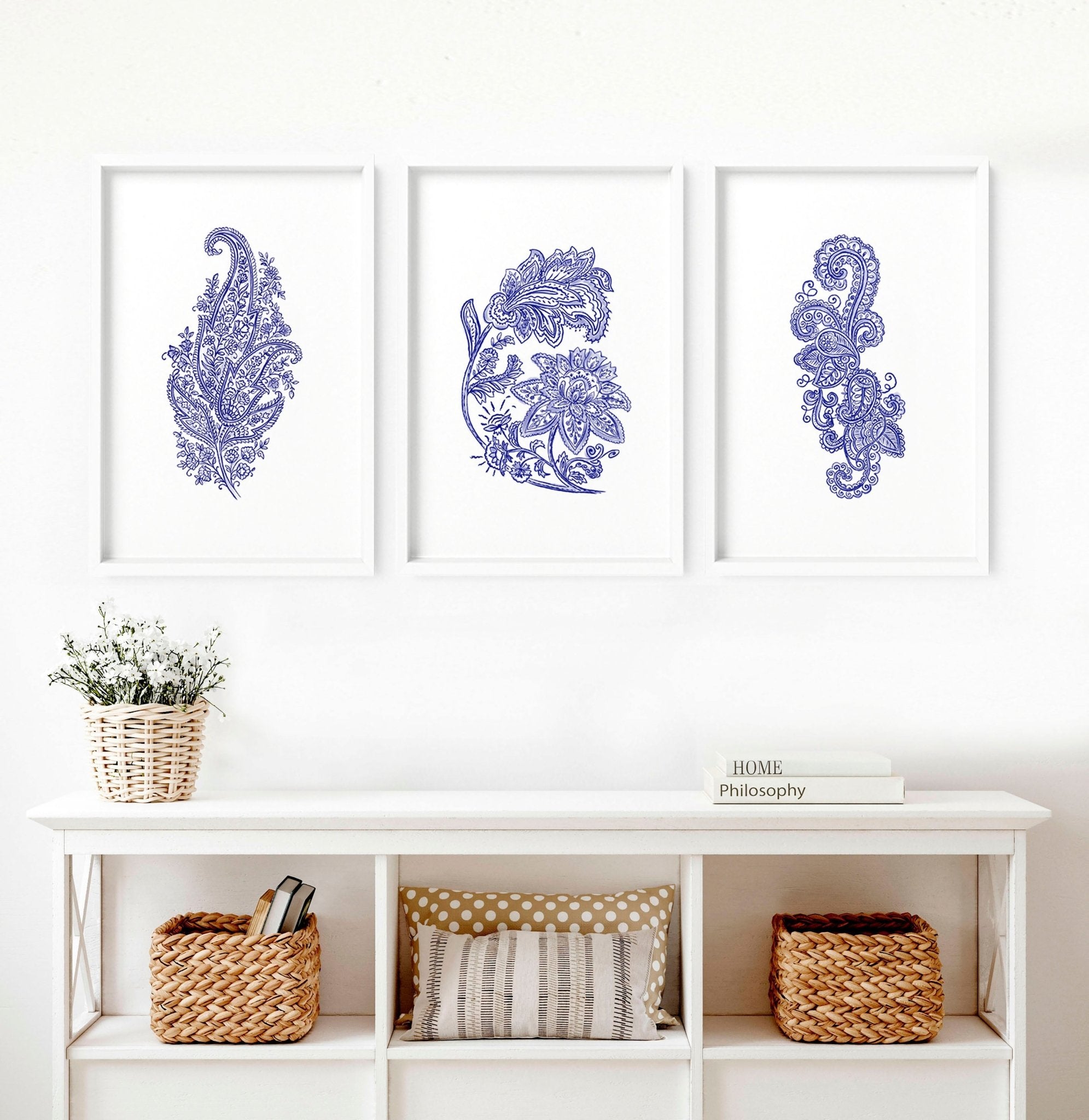 Set of 3 framed wall art prints featuring hand-drawn paisley motifs in indigo blue, perfect for bohemian living room decor.