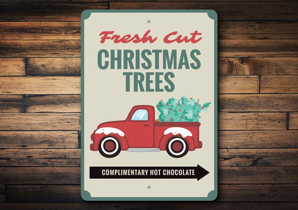 A decorative Fresh Cut Christmas Trees Sign made of aluminum, featuring festive designs and customizable text, perfect for holiday decor.