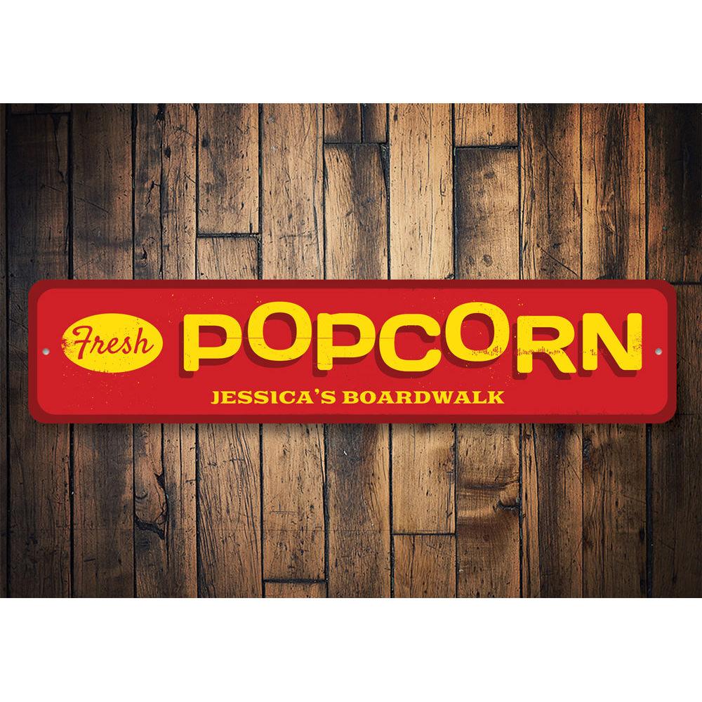 A vibrant Fresh Popcorn Sign made of aluminum, featuring colorful graphics perfect for beach houses and seafood restaurants.