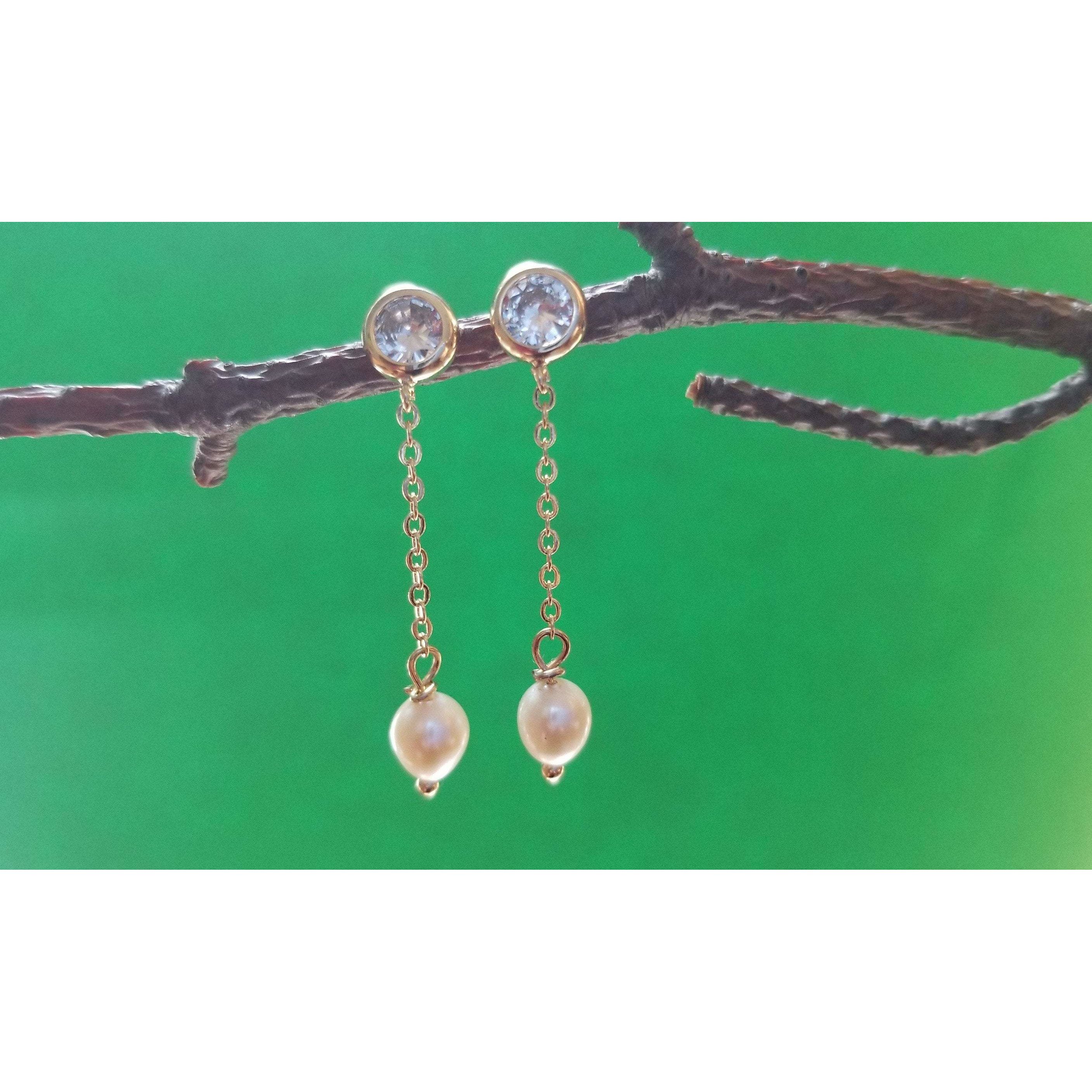 Elegant fresh water white pearl earrings with gold plating, featuring a long drop design, perfect for brides and special occasions.