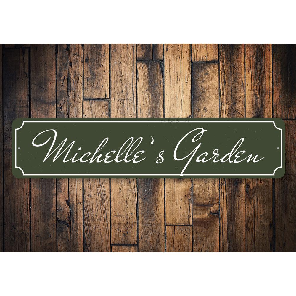 A personalized Garden Name Sign made of durable aluminum, featuring custom text and pre-drilled holes for easy mounting.