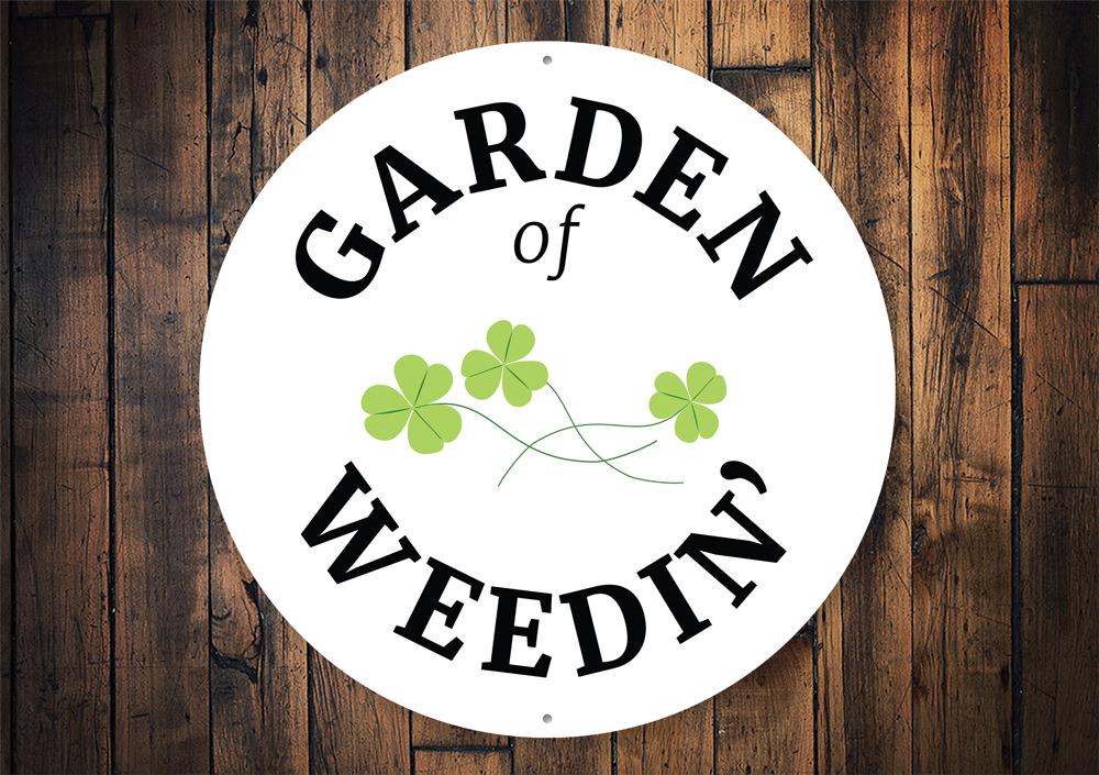 Garden of Weedin Sign made from high-quality aluminum, featuring a decorative design perfect for home decor.