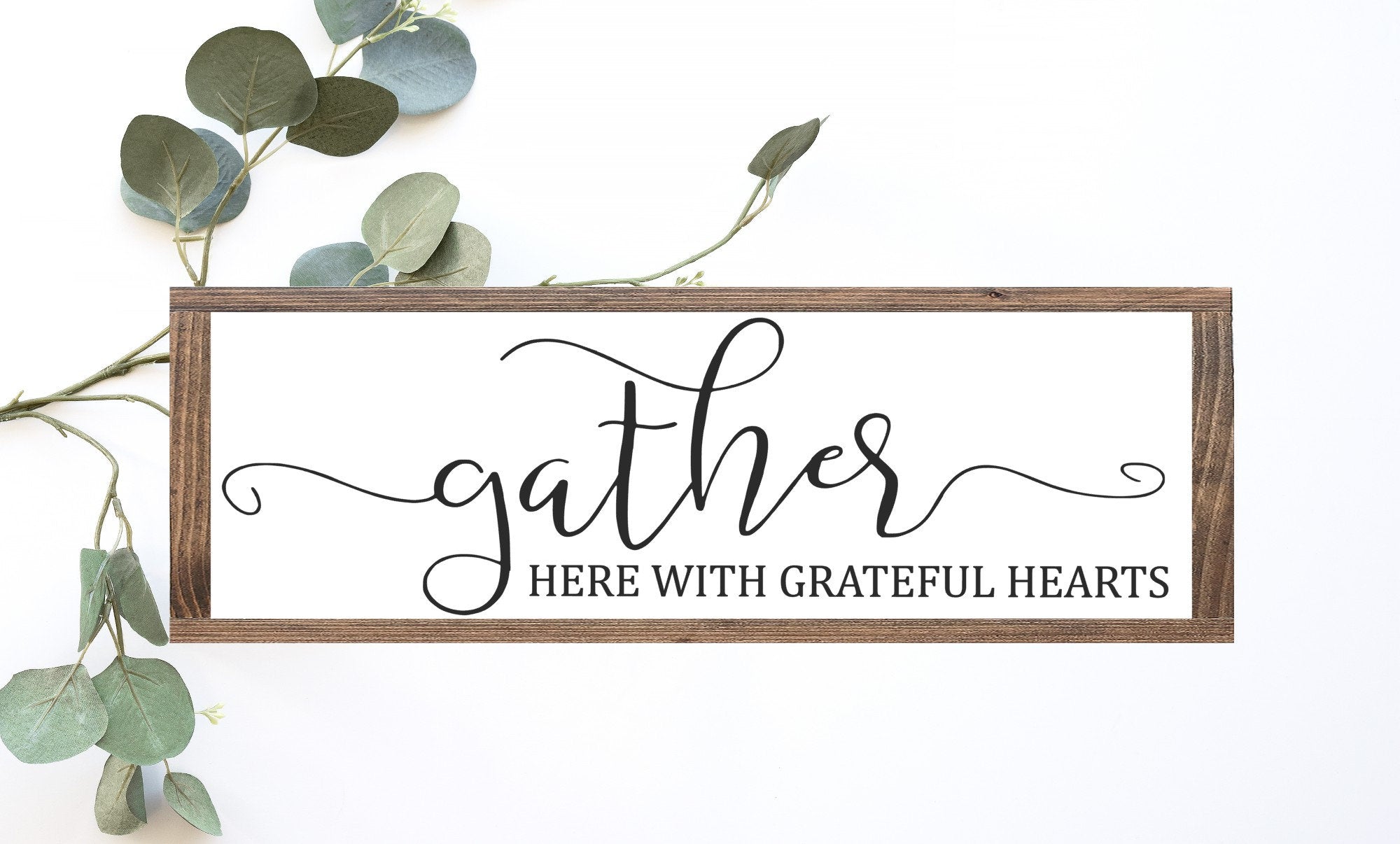 Gather Here With Grateful Hearts Wood Sign in matte white finish, showcasing unique wood grain and knots.