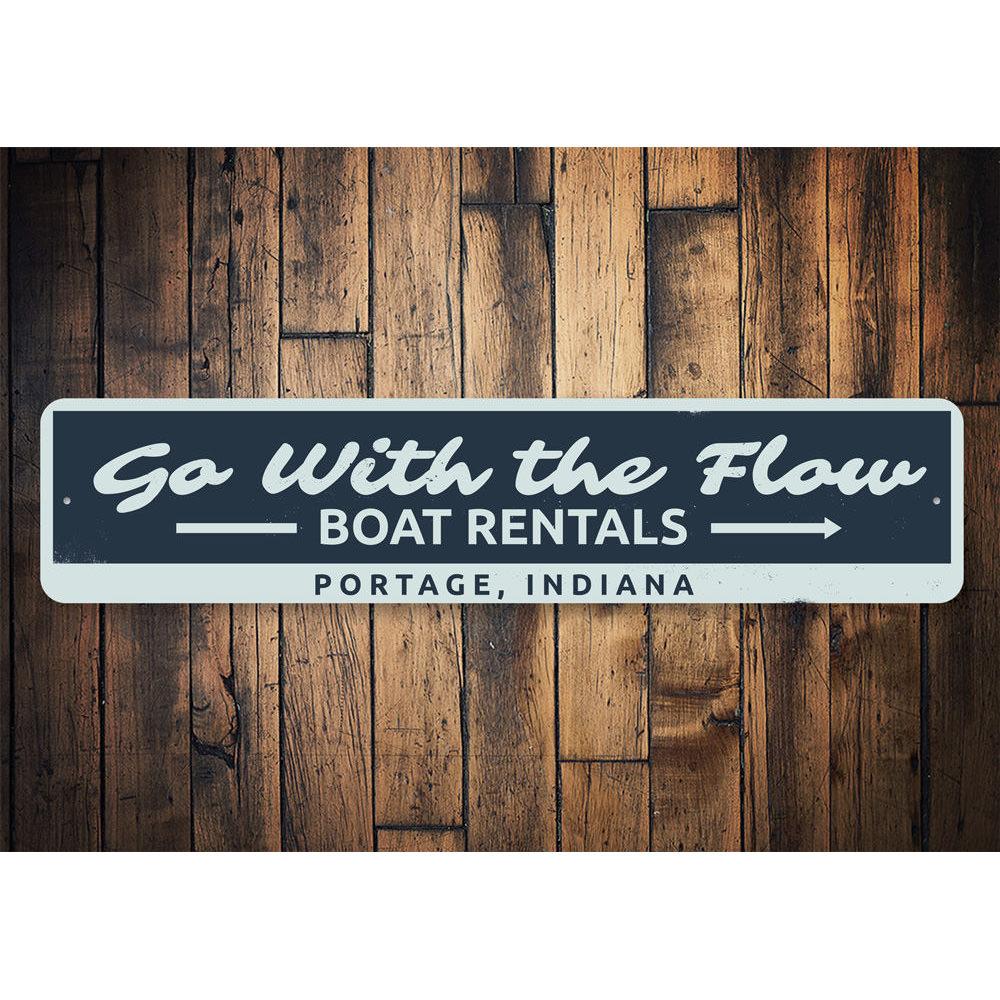 Go with the Flow Lake Sign made of durable aluminum, featuring a beautiful lake-themed design, perfect for lakehouses.