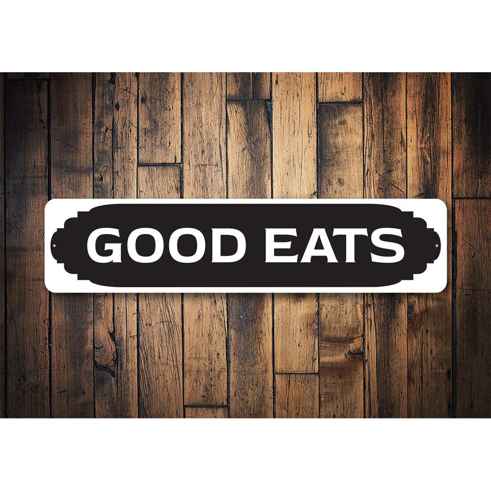 Good Eats Kitchen Sign made of durable aluminum, featuring a charming design perfect for kitchen decor.