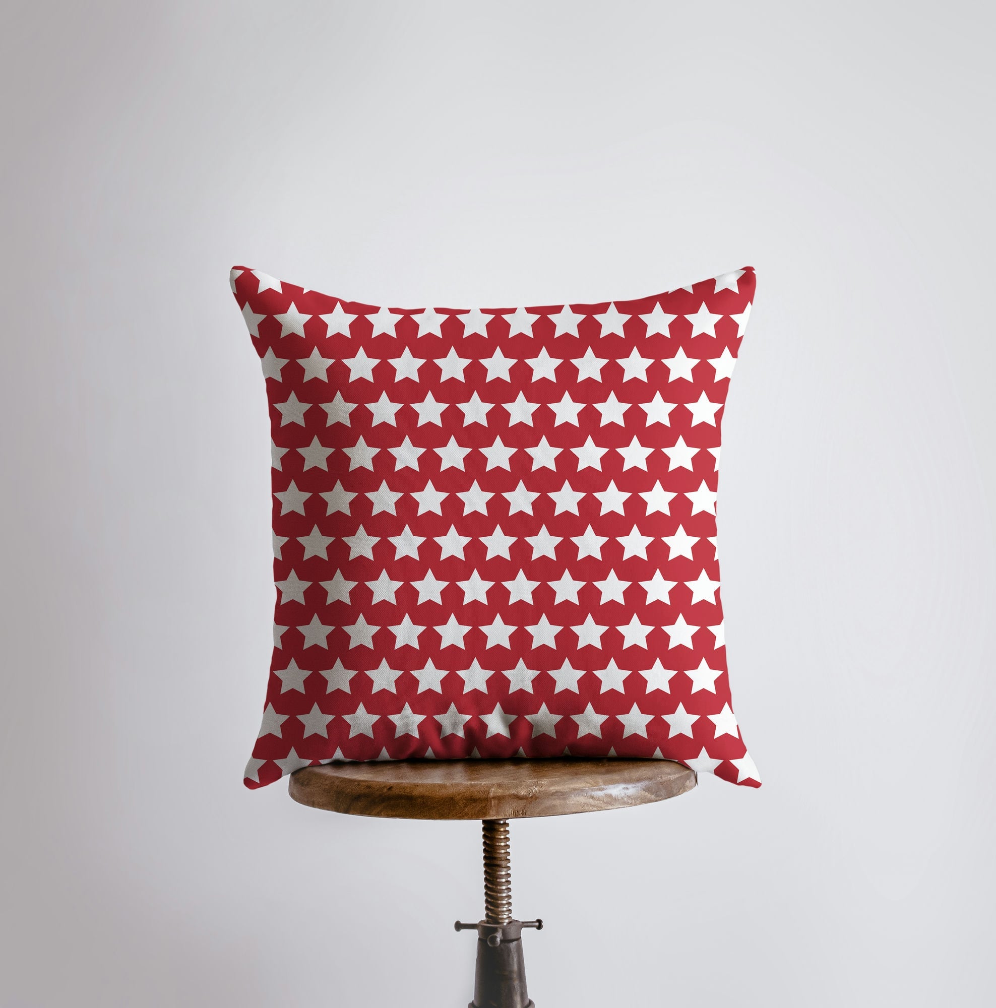 Handmade throw pillow featuring 'God Shed His Grace on Thee' design with red stars on the back, perfect for patriotic home decor.