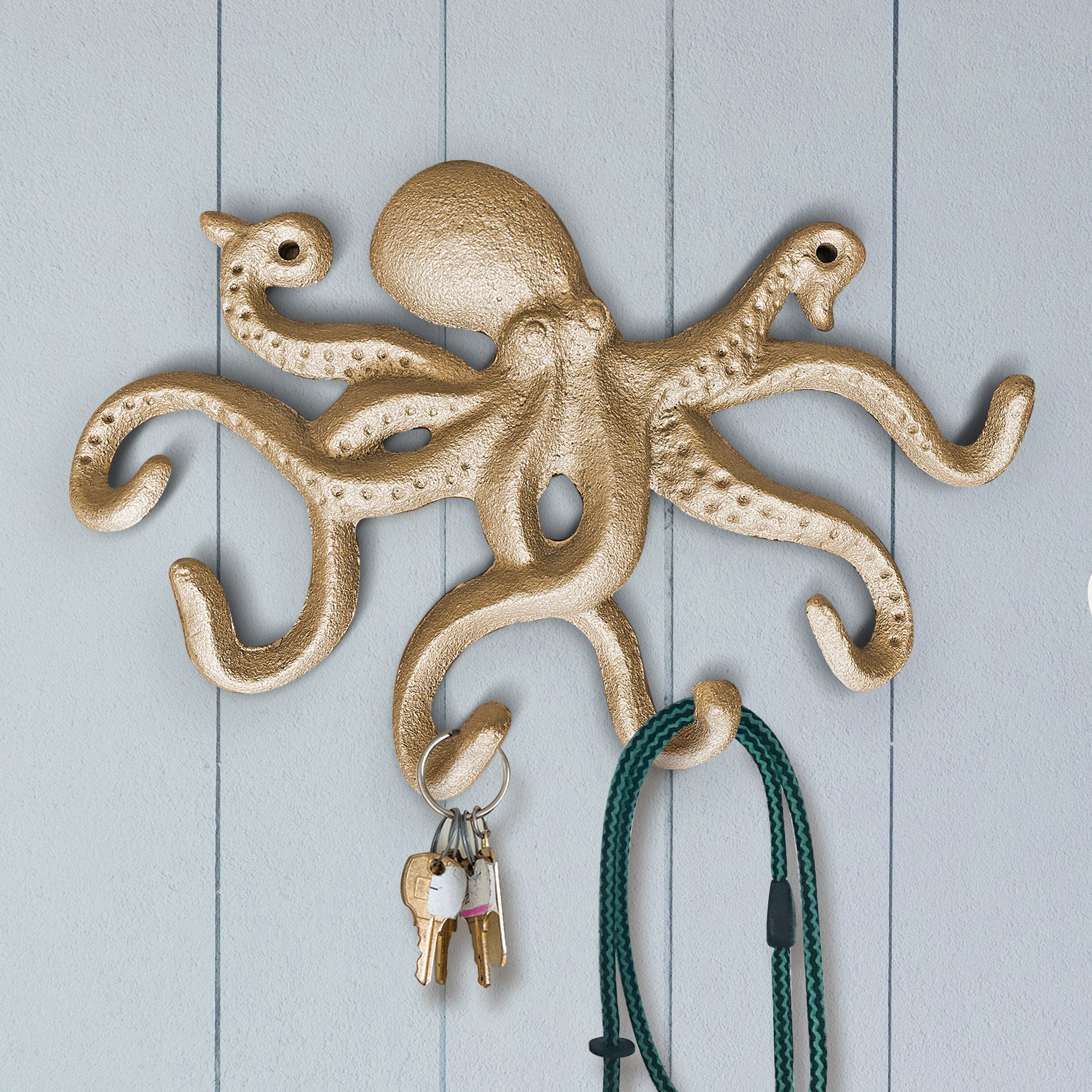 Gold Cast Iron Octopus Wall Hook, intricately designed with a nautical theme, perfect for hanging keys and leashes.