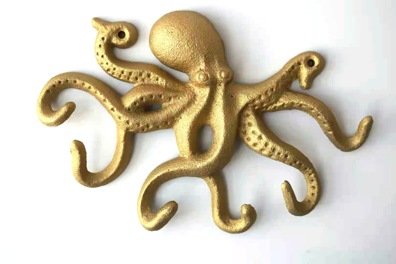 Gold Cast Iron Octopus Wall Hook, intricately designed with a nautical theme, perfect for hanging keys and leashes.
