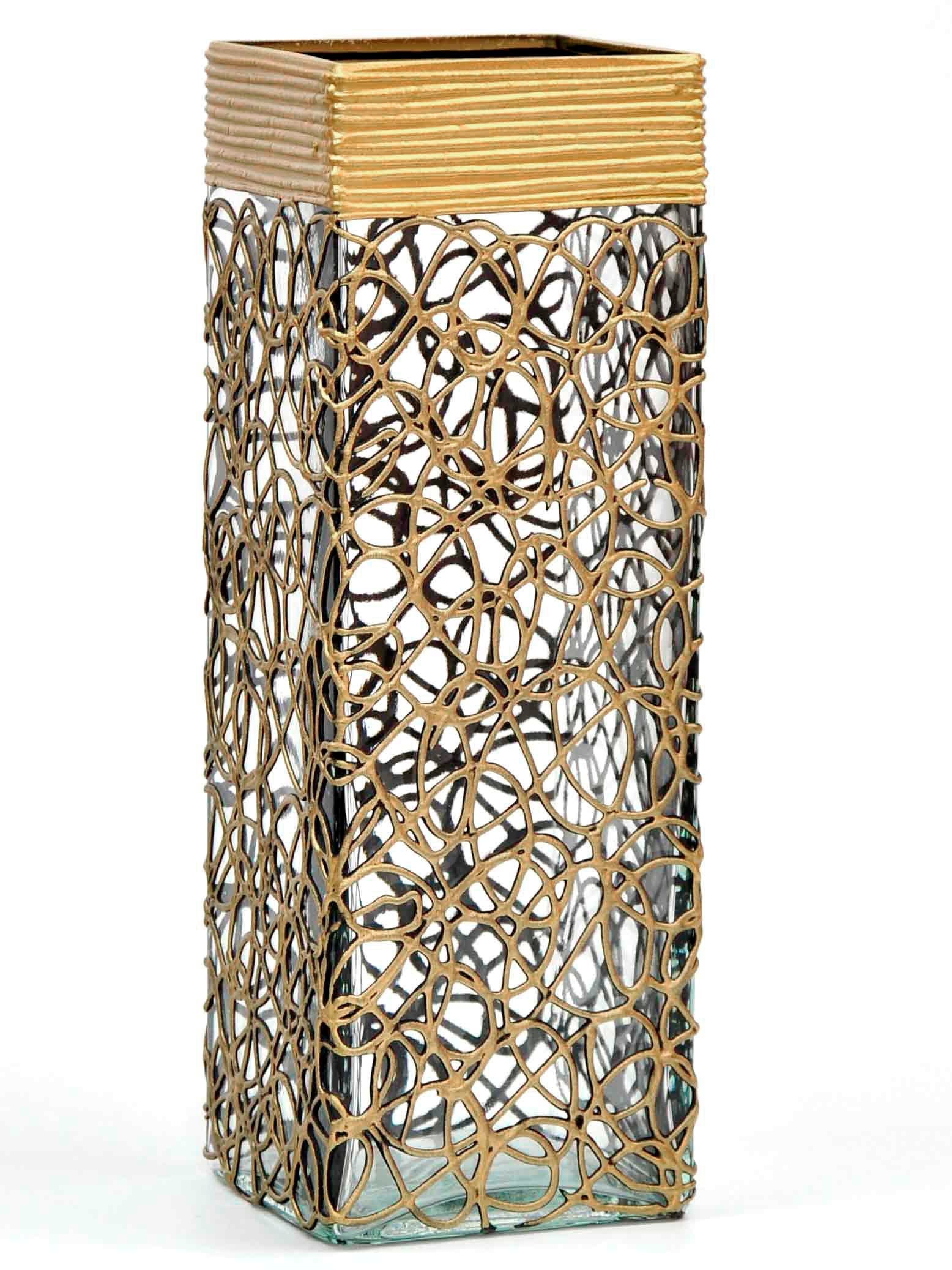 A beautifully hand-painted gold glass vase featuring unique designs and patterns, perfect for displaying flowers elegantly.