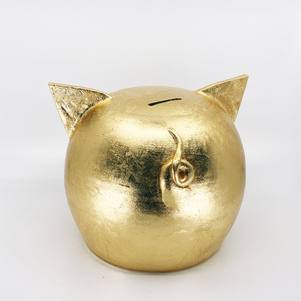 A luxurious golden piggybank from the Golden Collection, symbolizing luck and prosperity, crafted with premium golden foil.