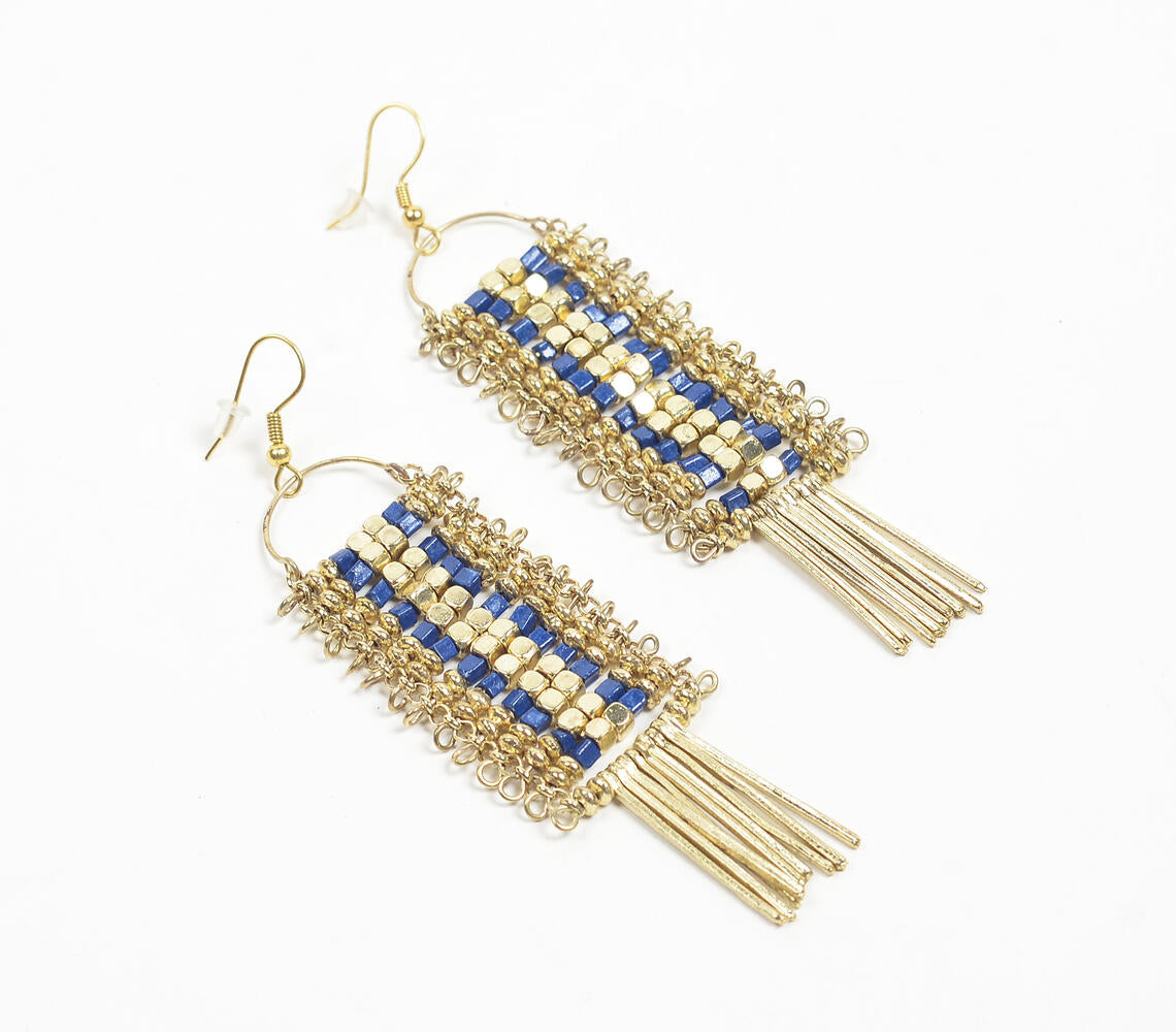 Gold-toned shoulder-duster earrings adorned with blue beads, showcasing intricate handmade craftsmanship.