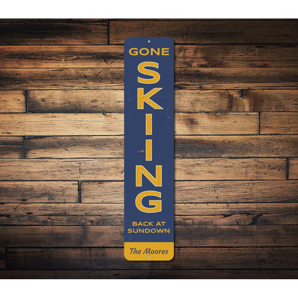 Gone Skiing Vertical Sign made of high-quality aluminum, featuring a ski-themed design, perfect for home decor.