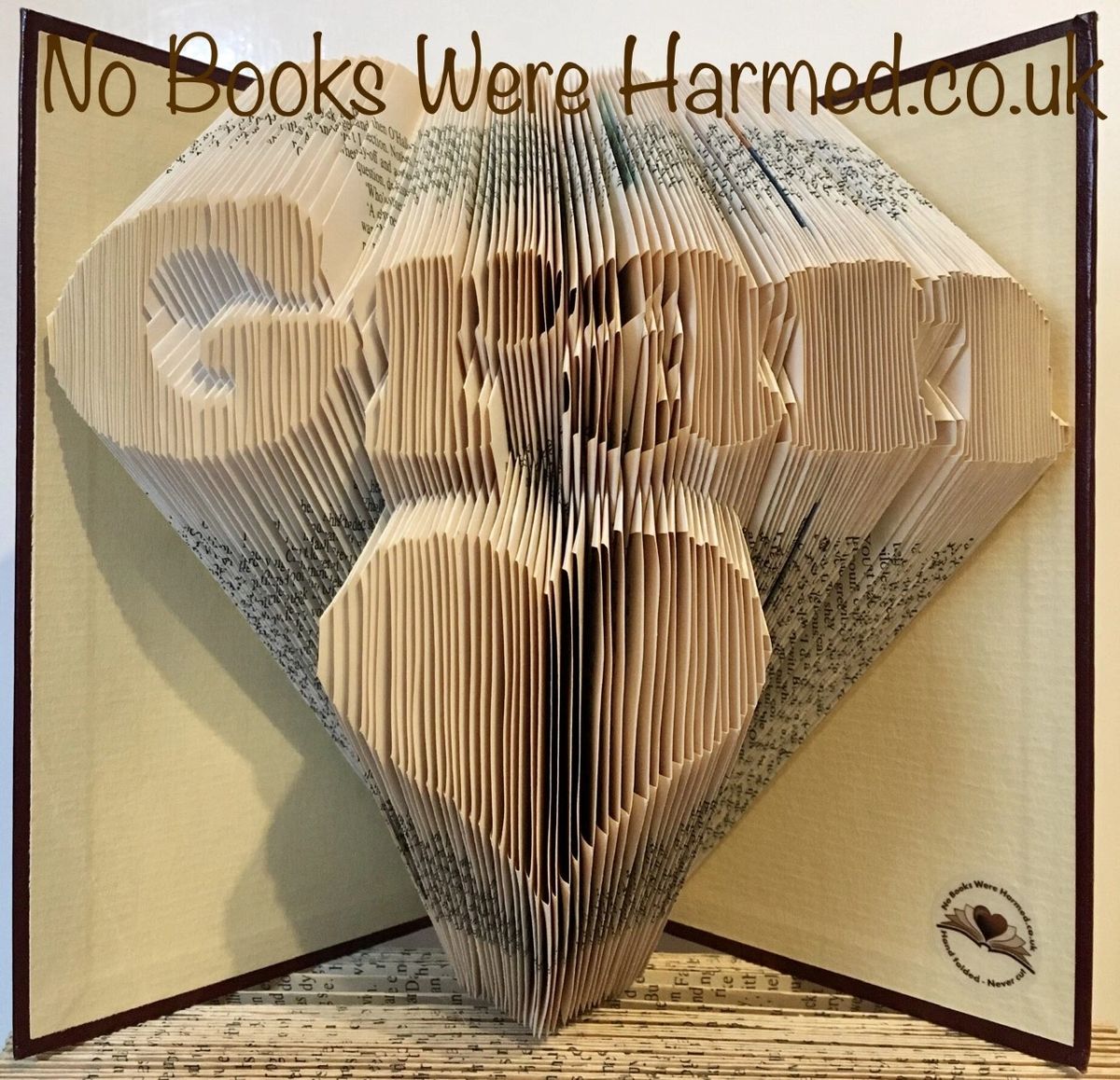 Handcrafted art piece featuring 'Gran' over a love heart, made from vintage book pages.