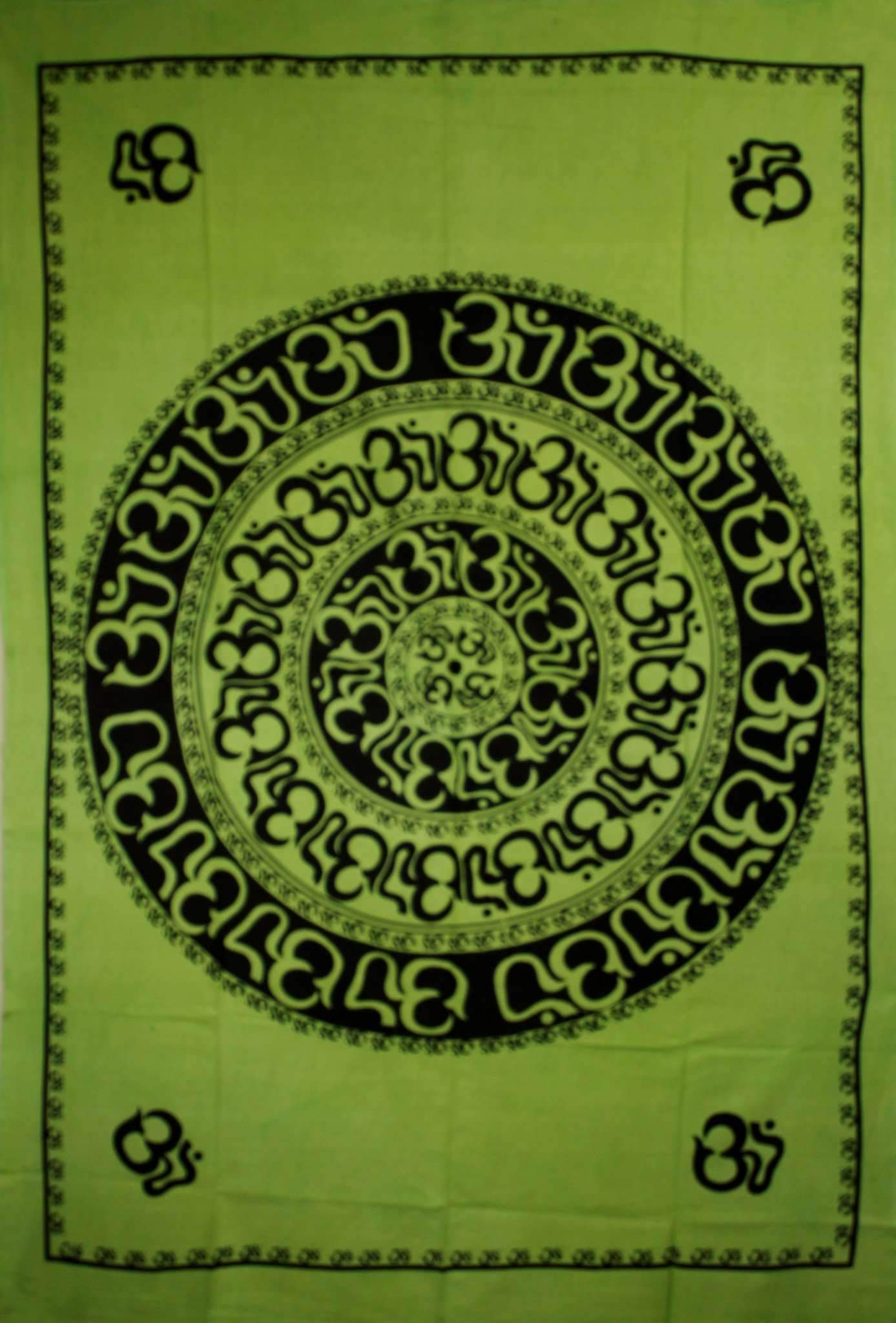 Green Om Shanti Mandala Art Tapestry featuring intricate OM symbols and vibrant colors, handmade from 100% cotton.