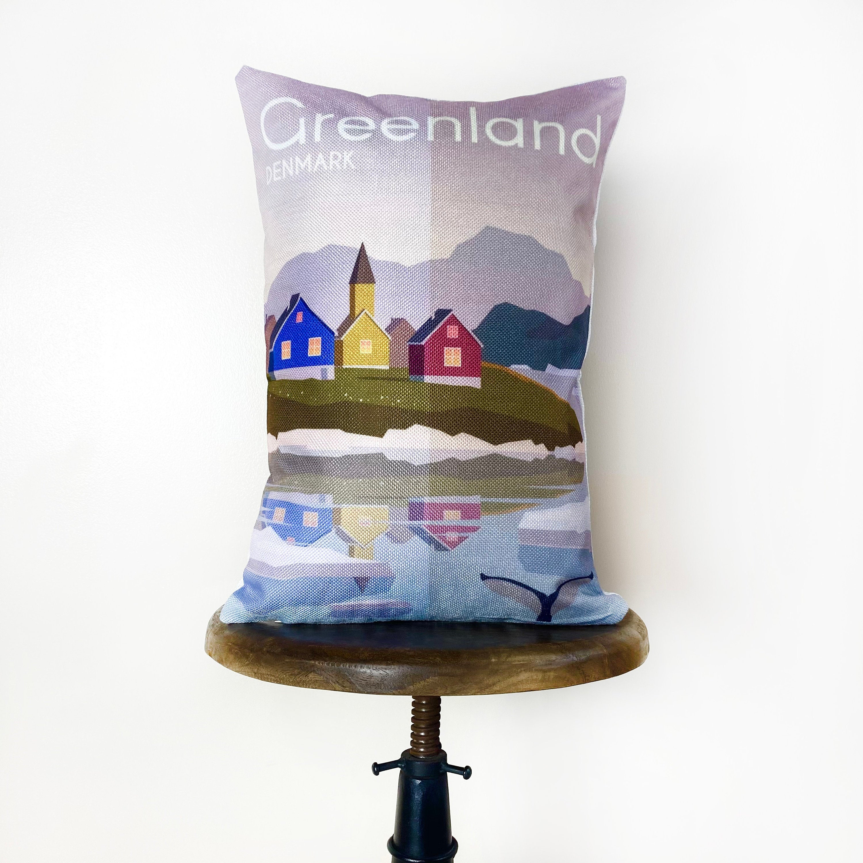 Handmade 12x18 pillow cover featuring a vibrant travel poster of Greenland, showcasing its glaciers and fishing towns.