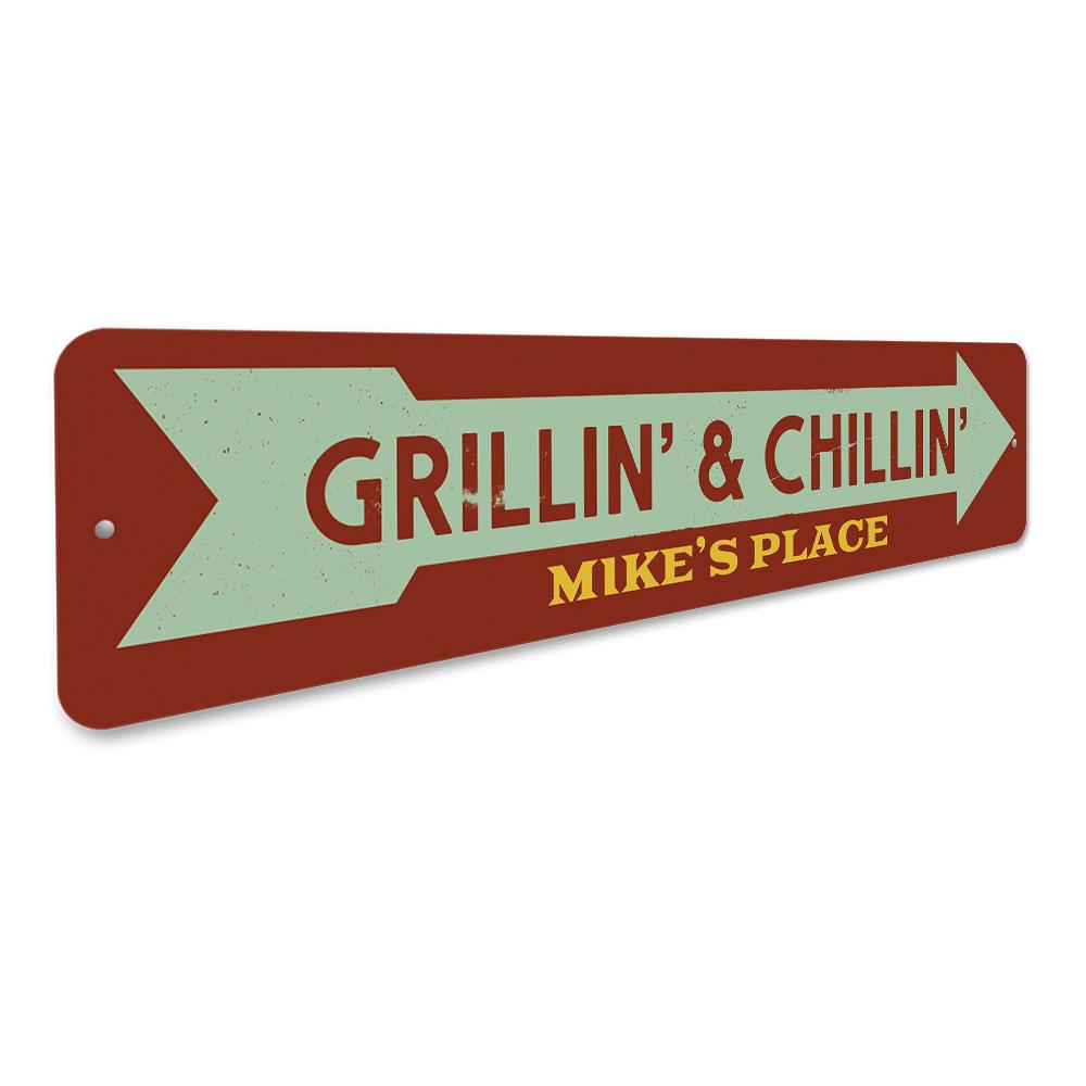 Grillin' & Chillin' decorative aluminum sign, featuring vibrant colors and customizable text, perfect for indoor or outdoor display.