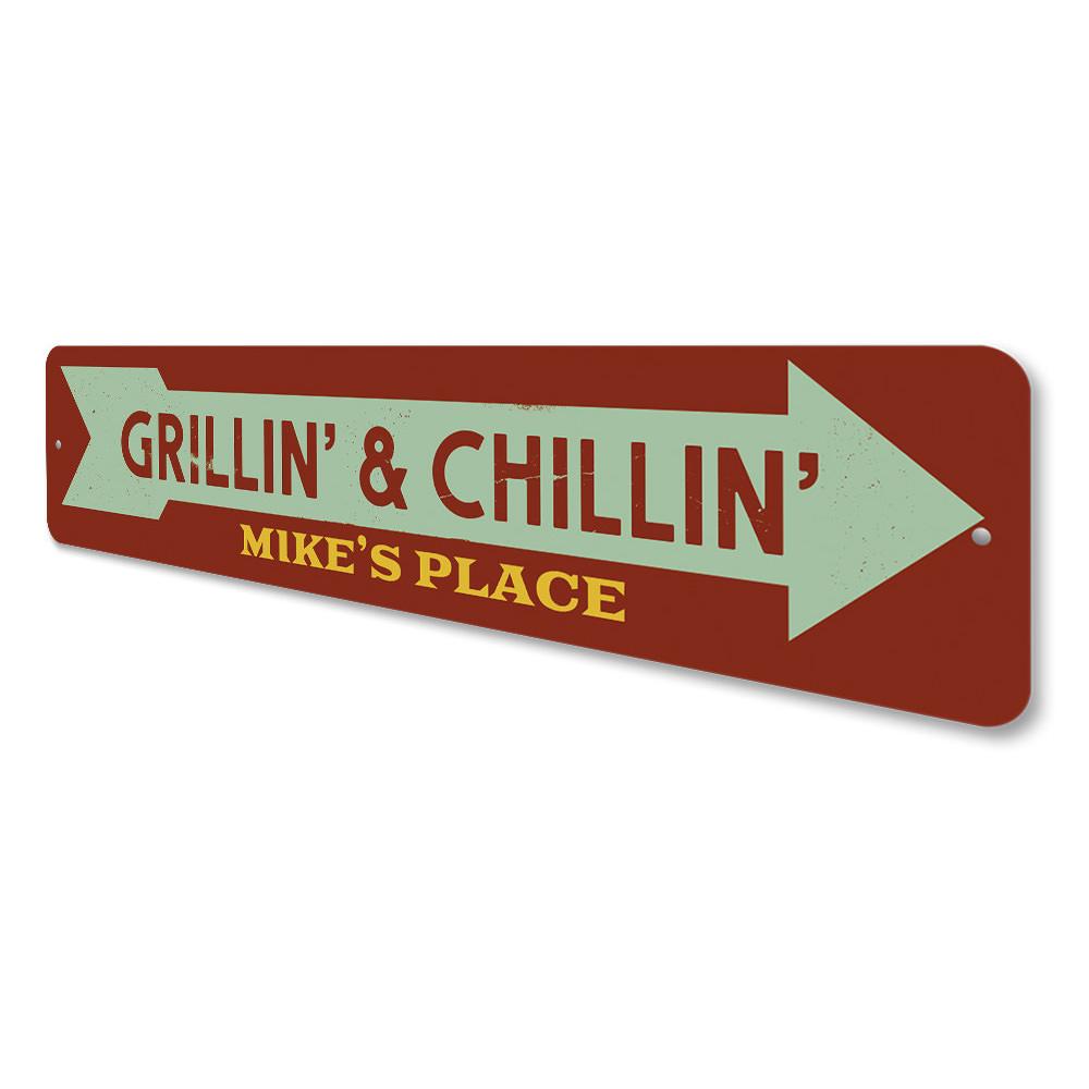 Grillin' & Chillin' decorative aluminum sign, featuring vibrant colors and customizable text, perfect for indoor or outdoor display.